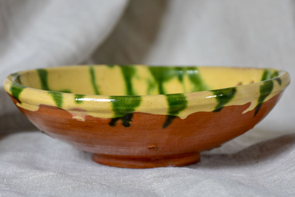 Vintage French strainer with green and yellow glaze