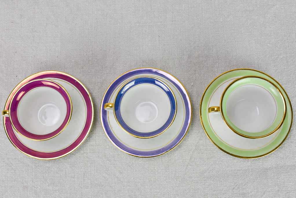 Gold-trimmed antique Limoges saucers