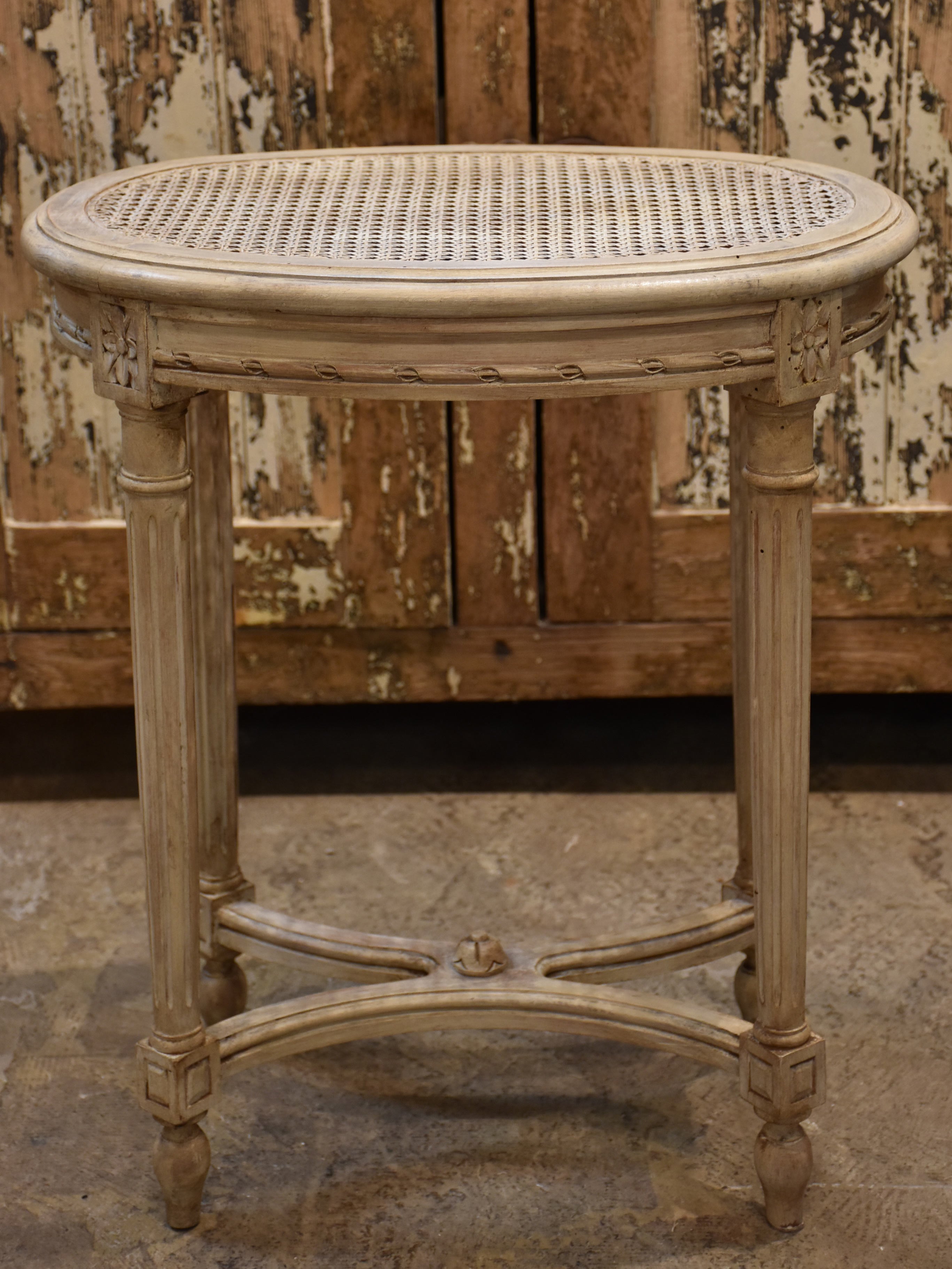 Antique Louis XVI side table with rattan top