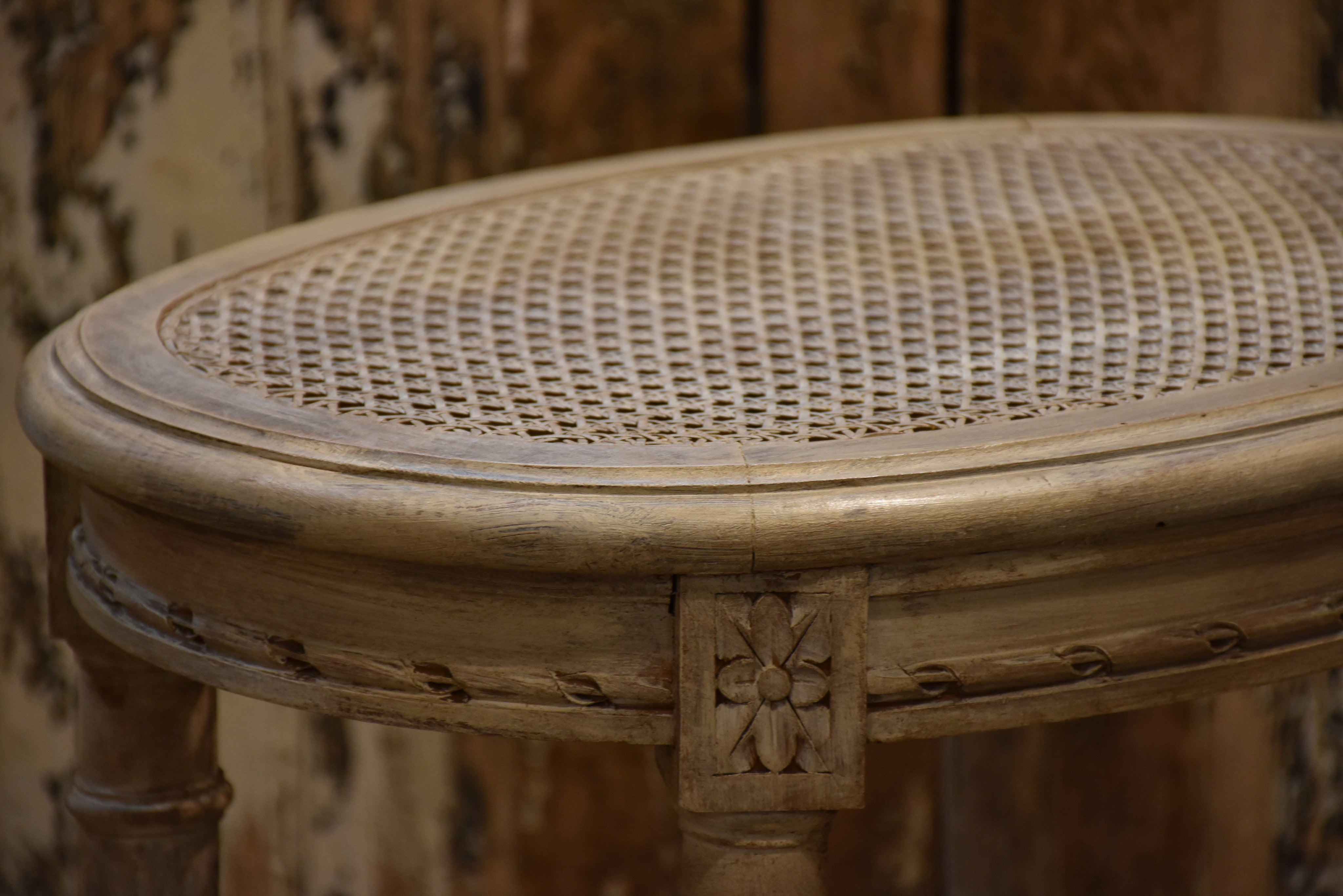 Antique Louis XVI side table with rattan top