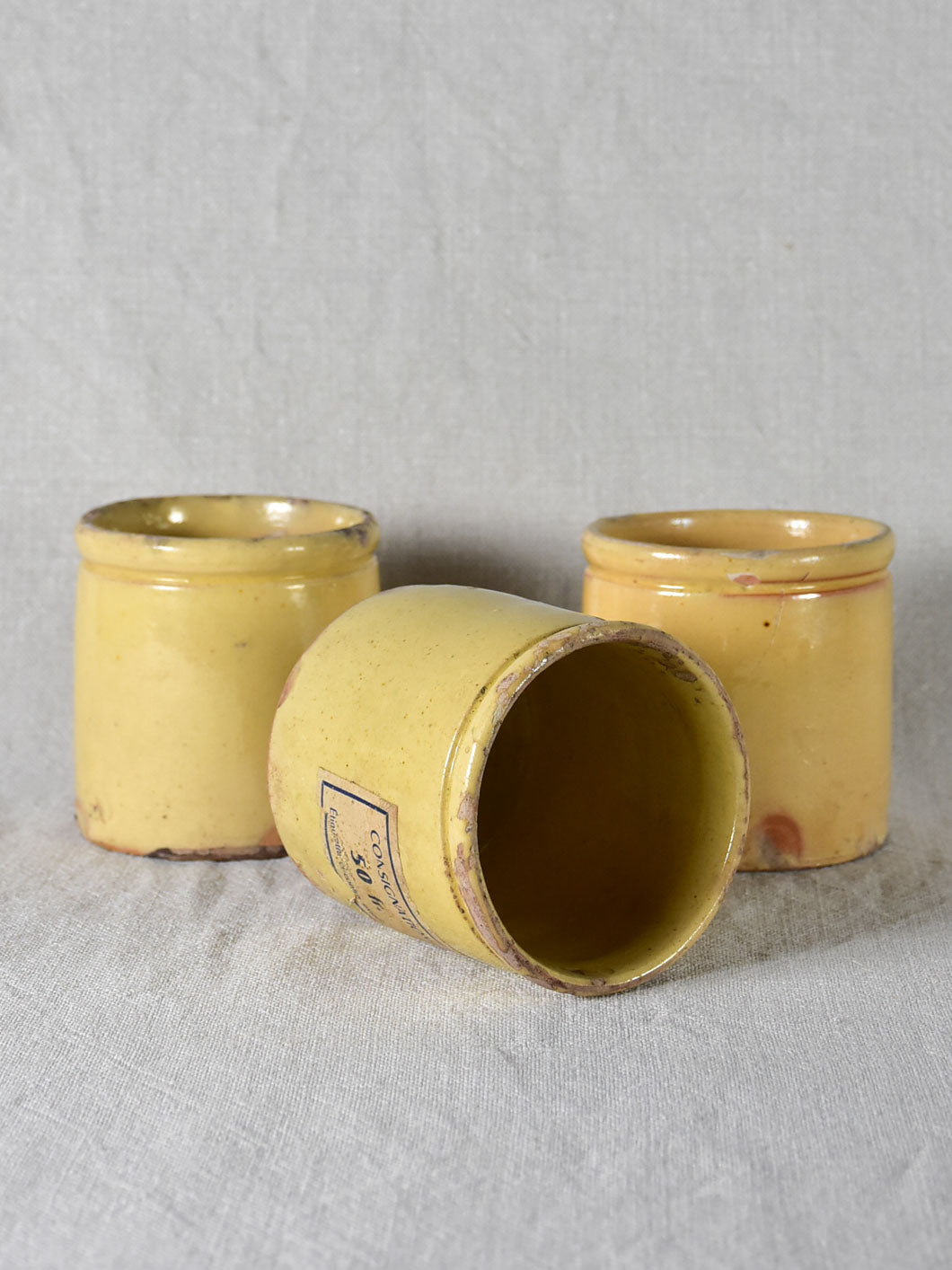 Three antique French yellow ware preserving jars 4"