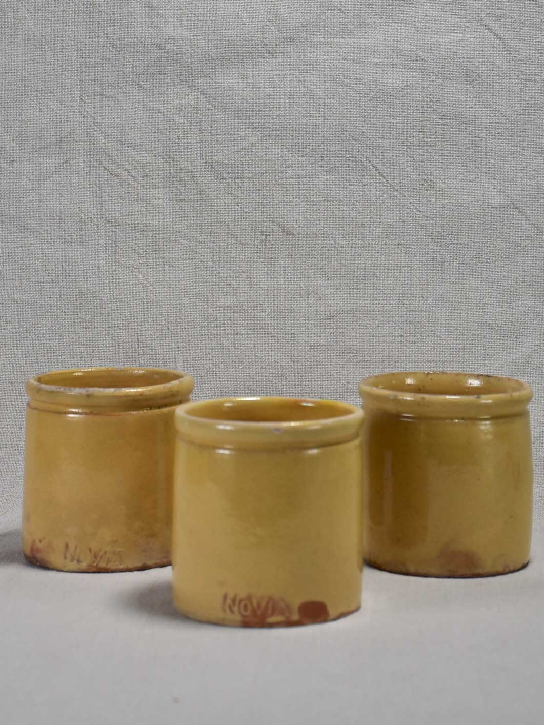 Three antique French yellow ware preserving jars 3½"