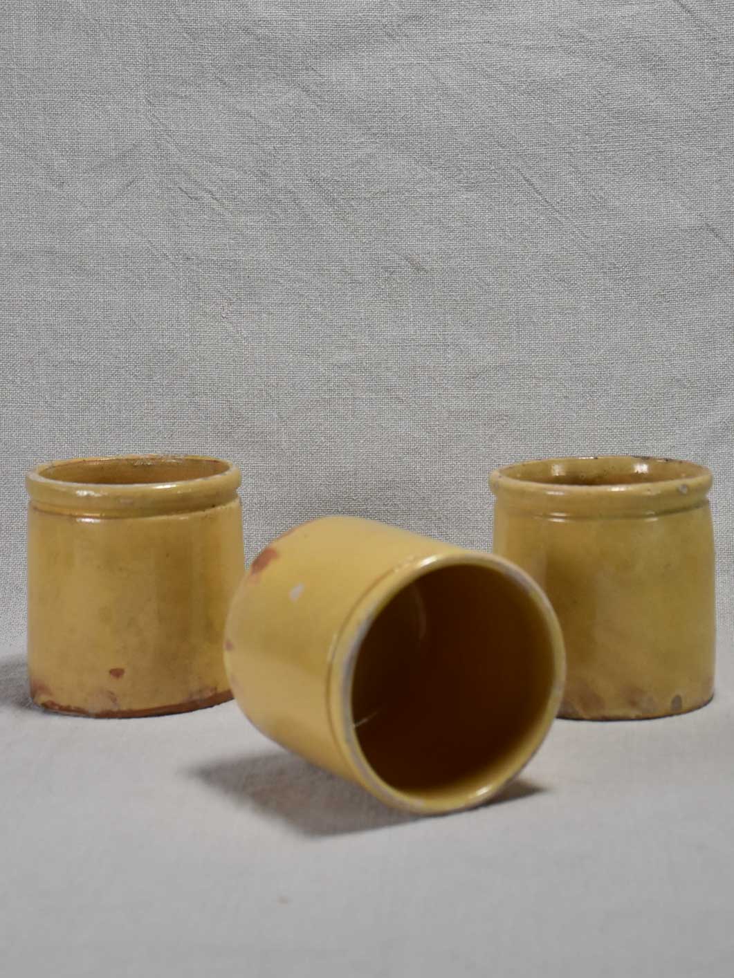 Three antique French yellow ware preserving jars 3½"