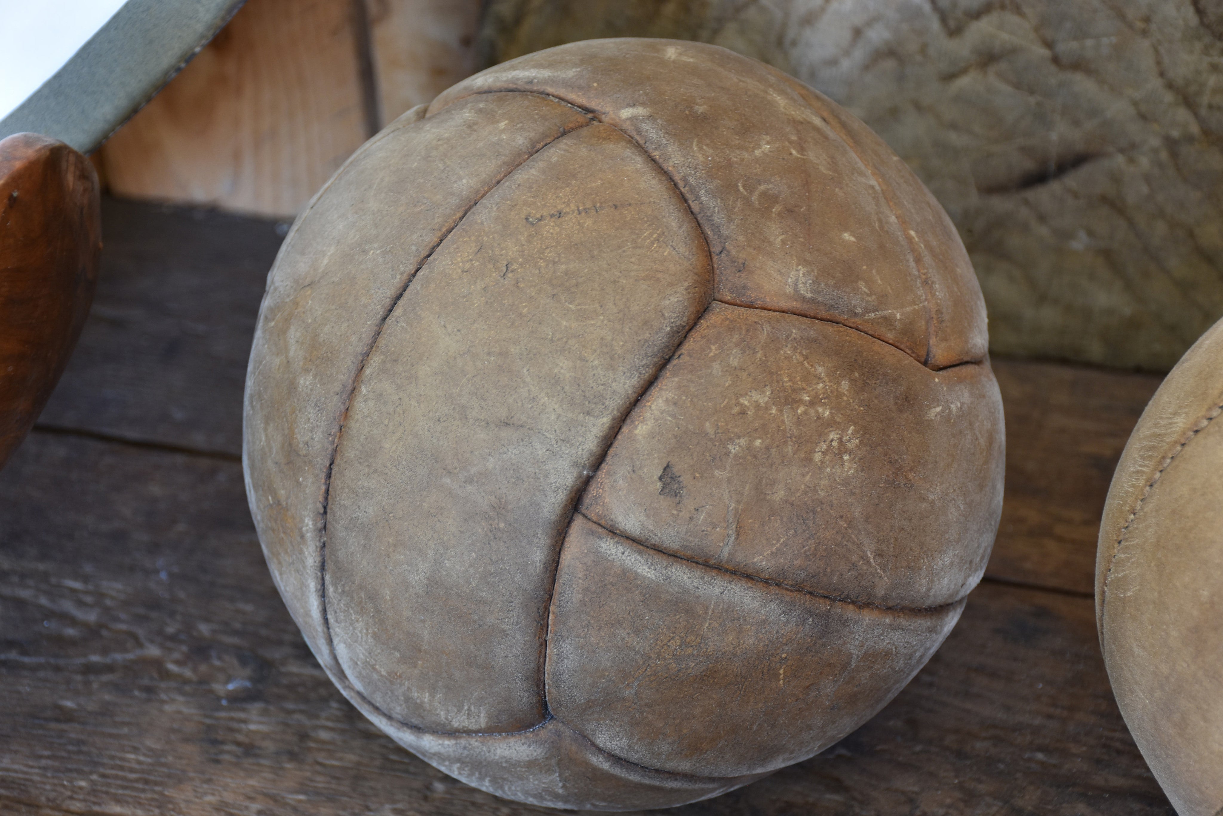 Two antique French medicine balls