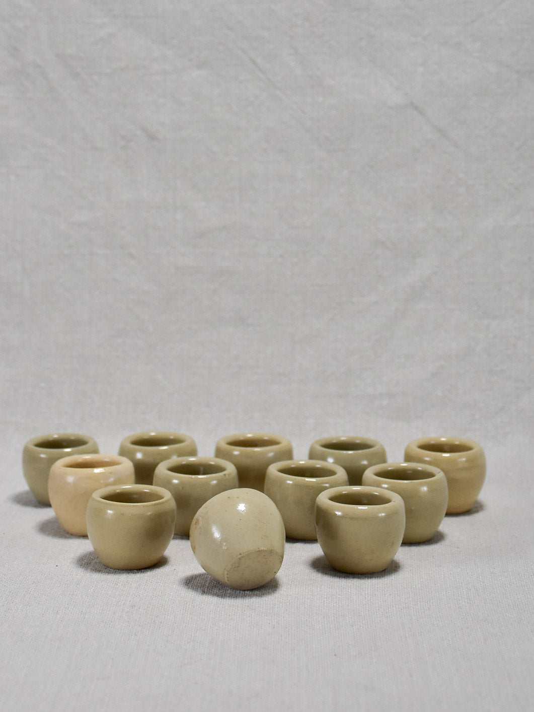 Collection of twelve vintage snail pots - gray glaze 1¼"