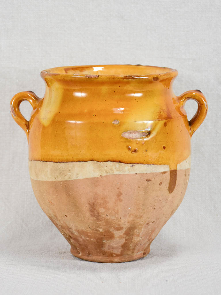 Small antique French confit pot with yellow / orange glaze 7"