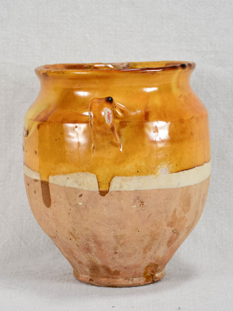 Small antique French confit pot with yellow / orange glaze 7"