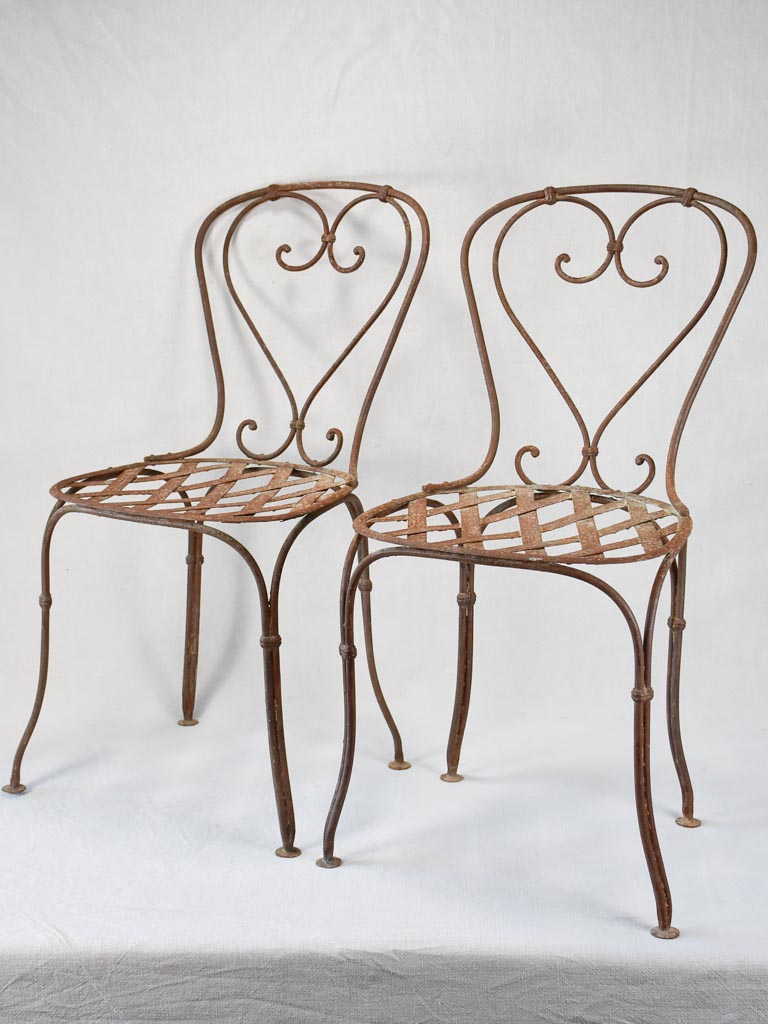 Pair of 19th century wrought iron garden chairs