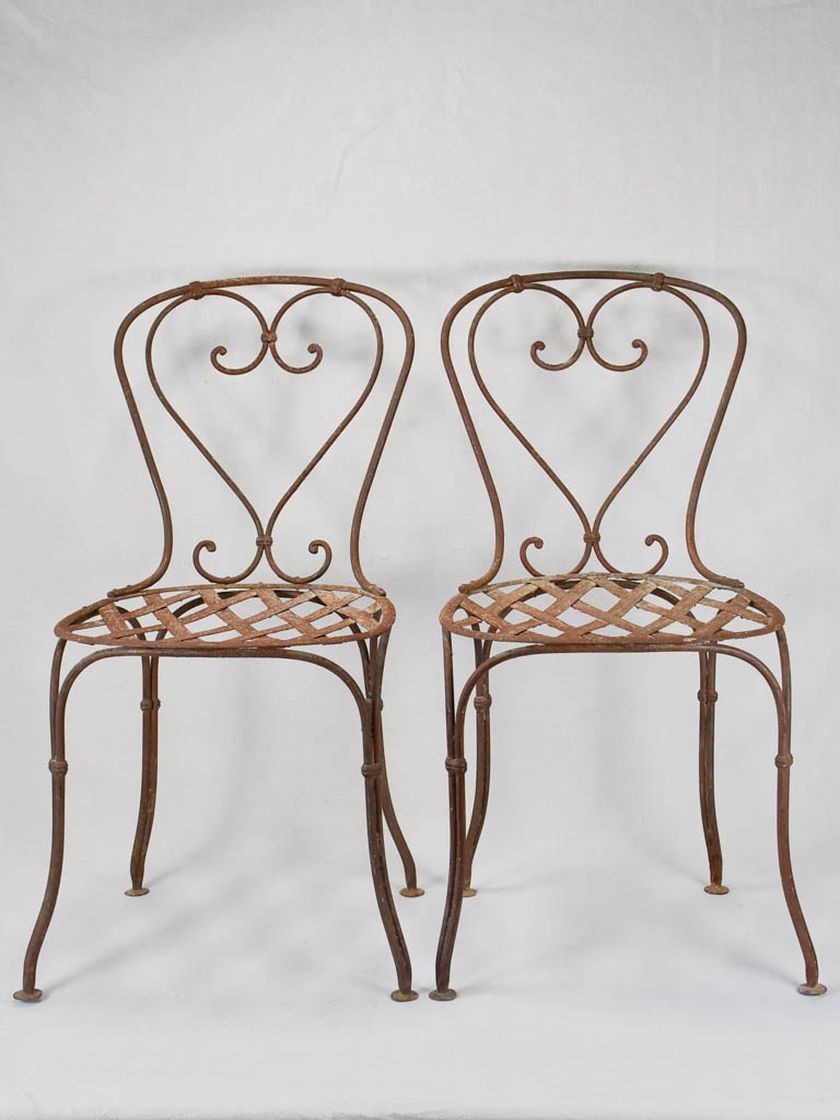 Pair of 19th century wrought iron garden chairs