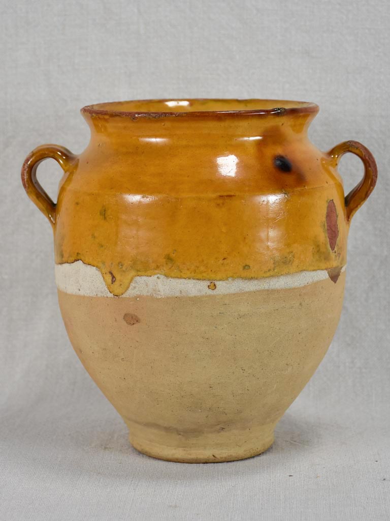 Small antique French confit pot with yellow / orange glaze and two handles 8¼"