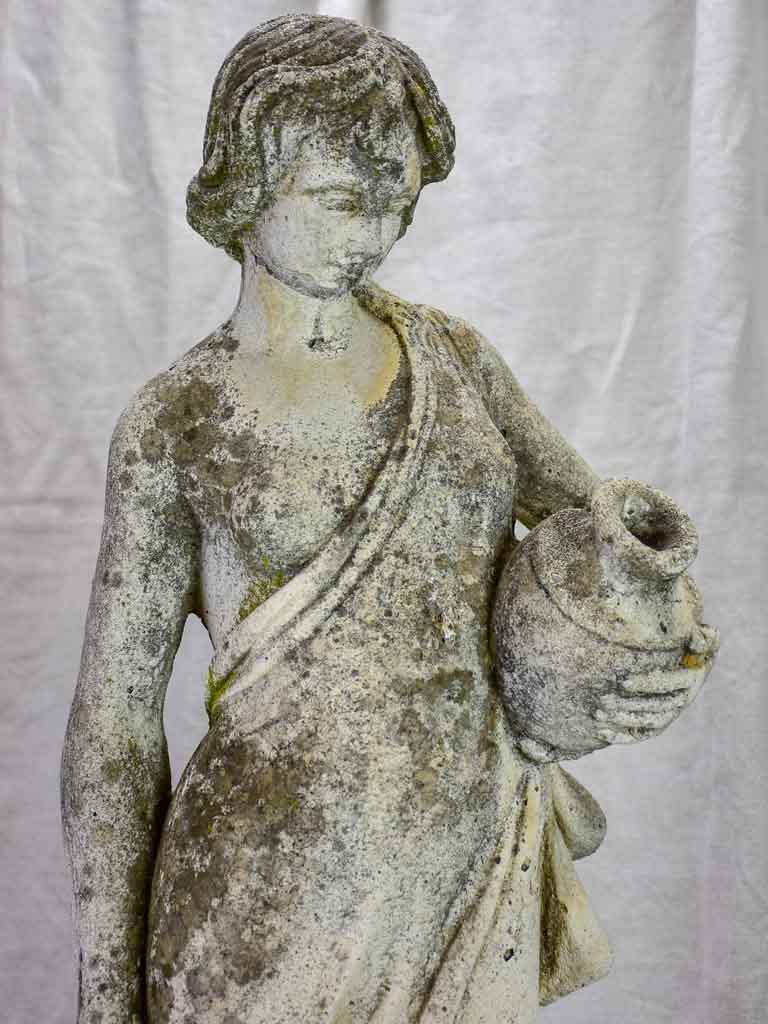 French sculpture of a draped lady collecting water 35"