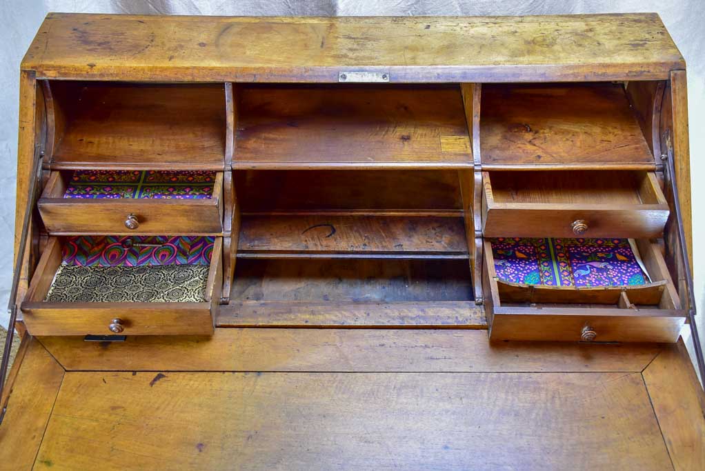 18th Century French secretaire with marquetry and two drawers