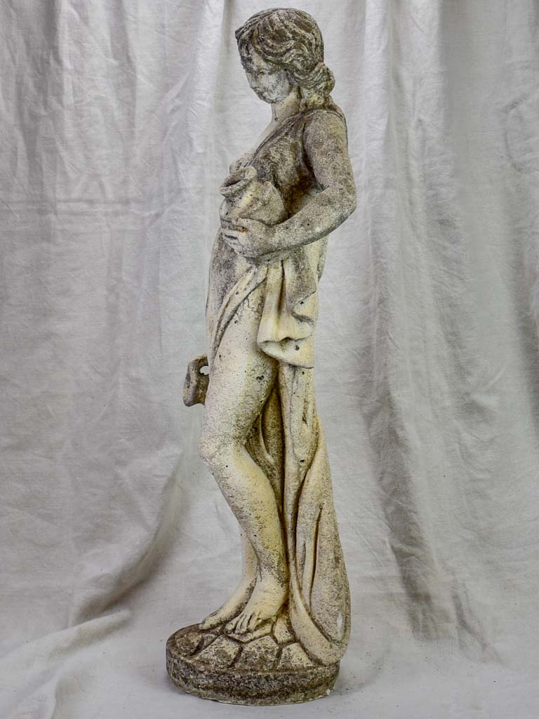 French sculpture of a draped lady collecting water 35"