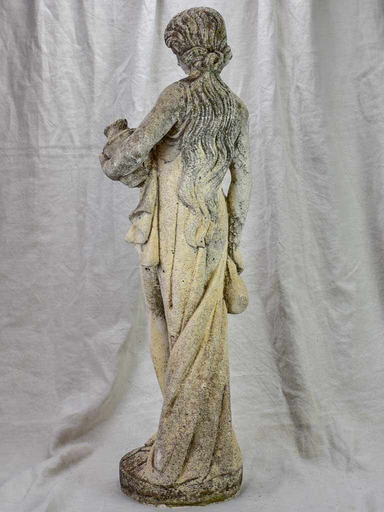 French sculpture of a draped lady collecting water 35"