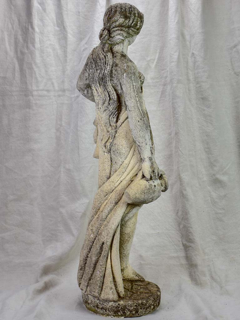 French sculpture of a draped lady collecting water 35"