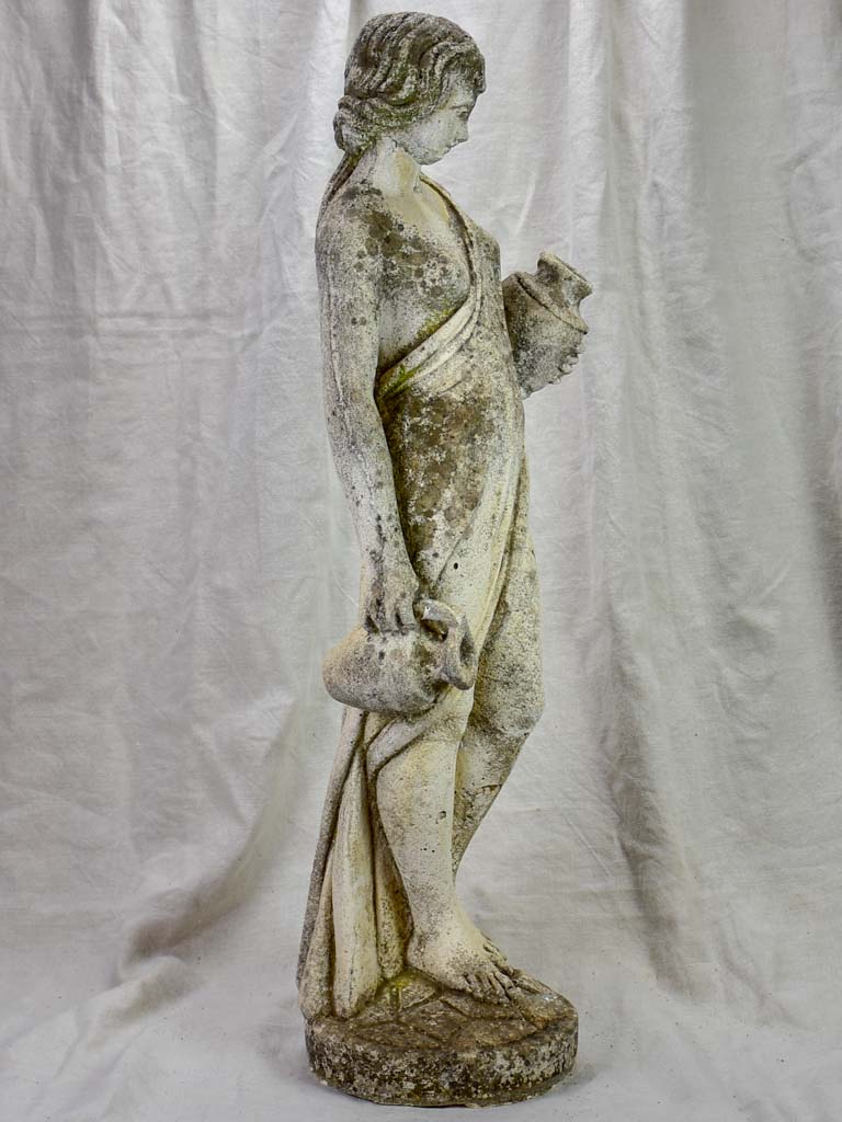 French sculpture of a draped lady collecting water 35"