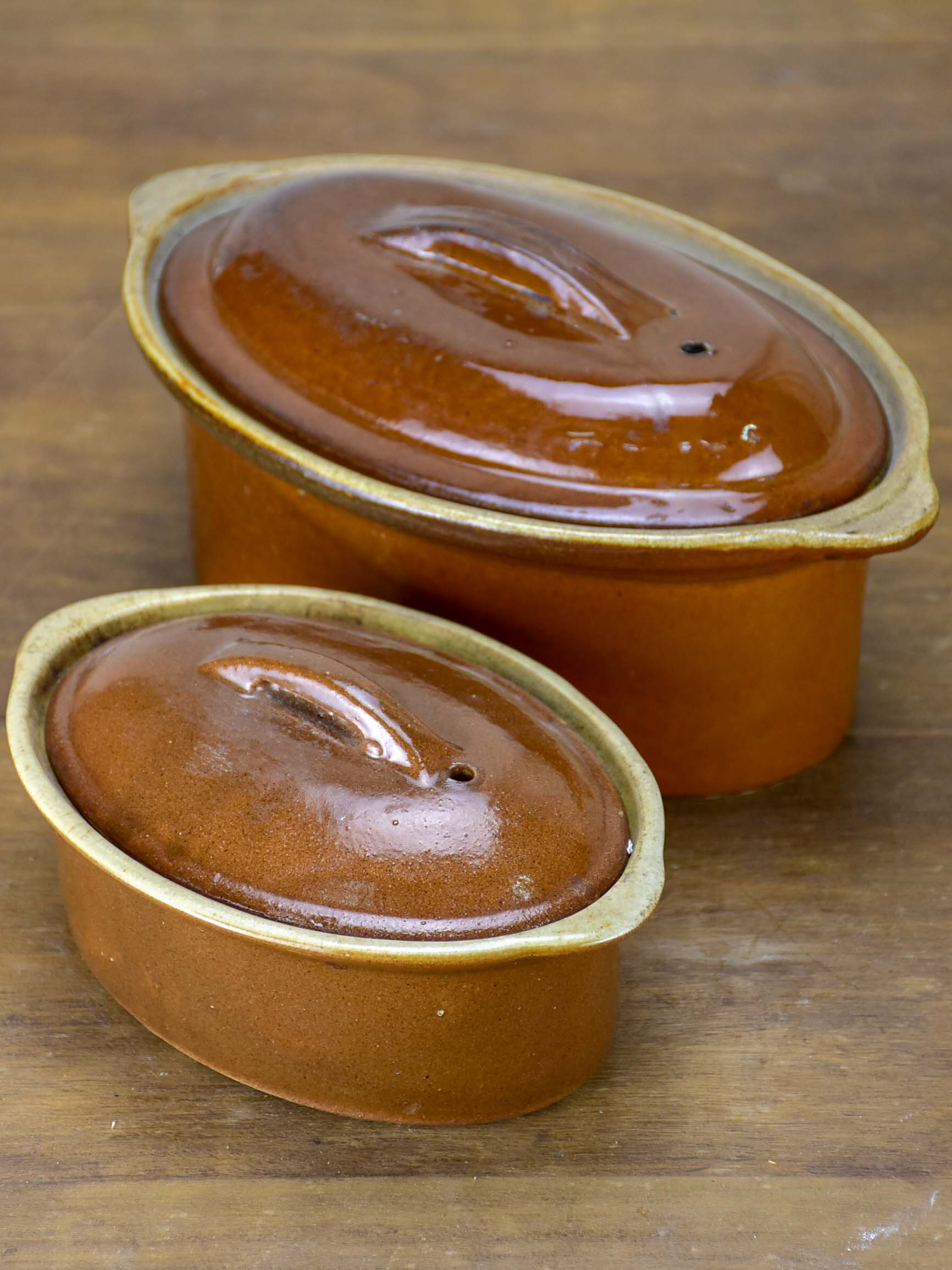 Two late 19th Century French tureens with brown glaze