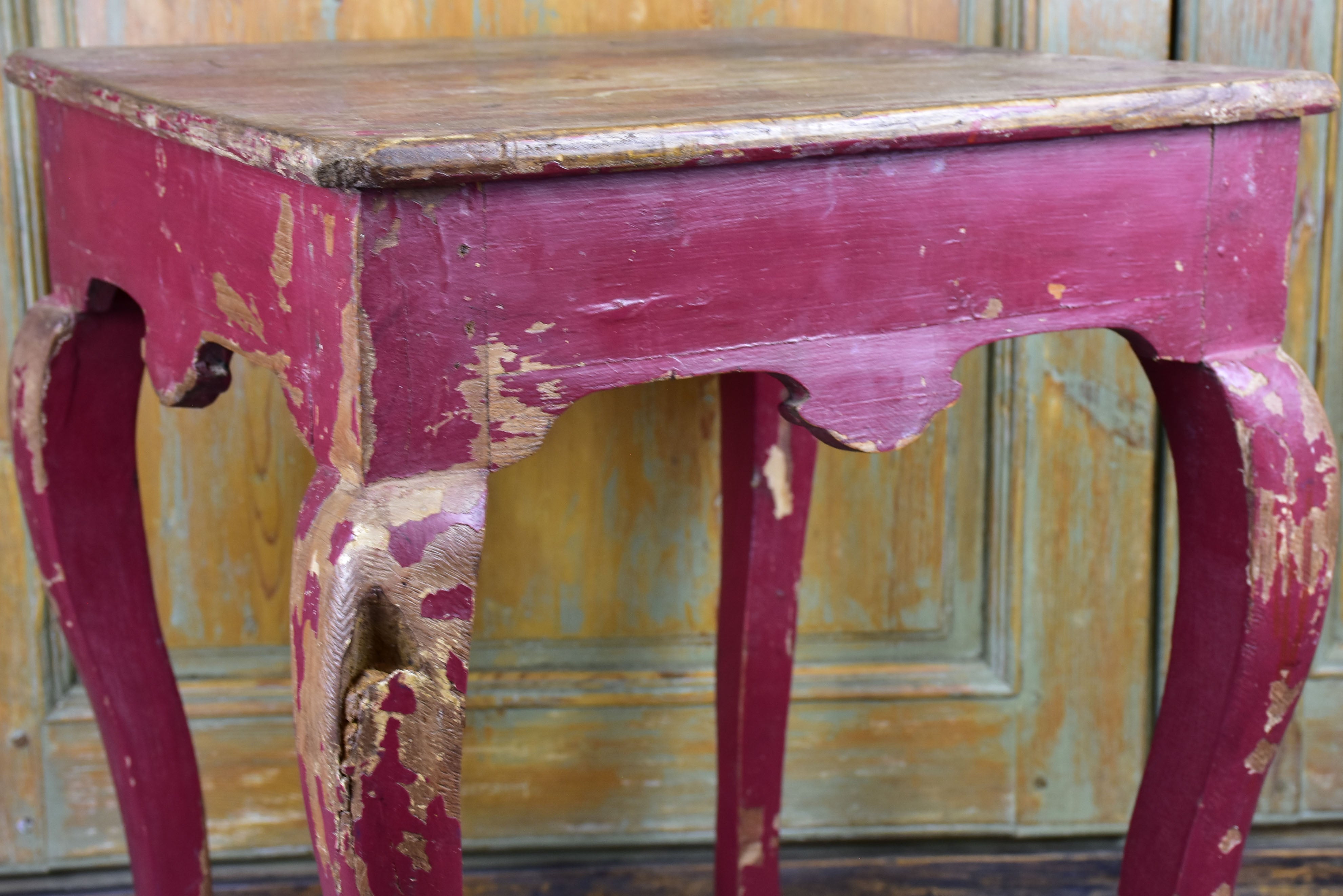 Antique Chinese side table with red patina