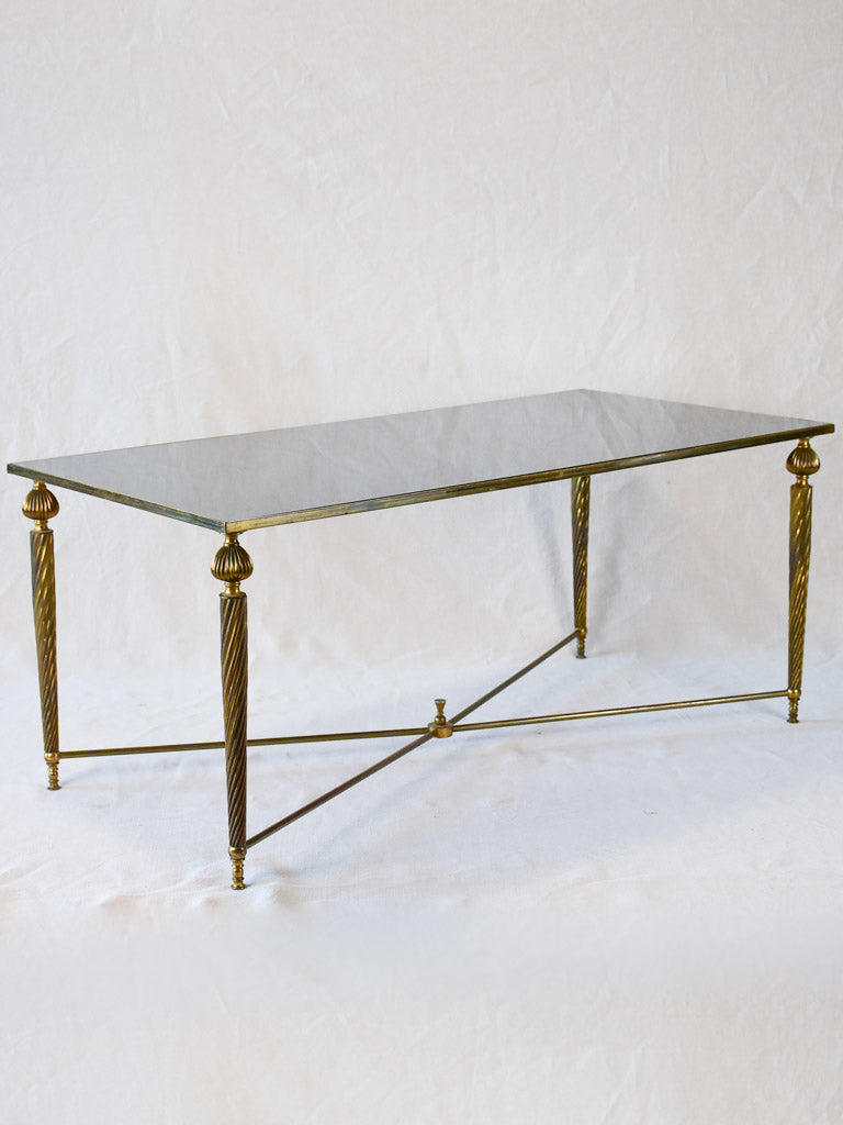 Mid century glass and brass coffee table with twisted tapered legs 39½" x  19¼"