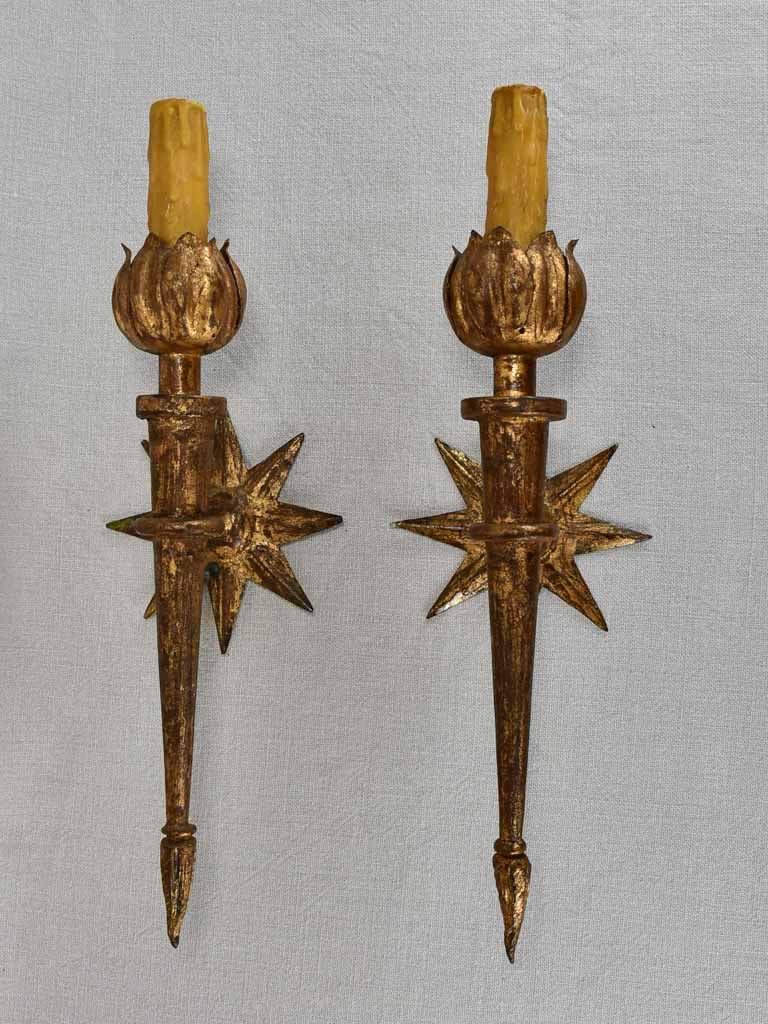 Pair of mid-century wall sconces with star motifs 17"