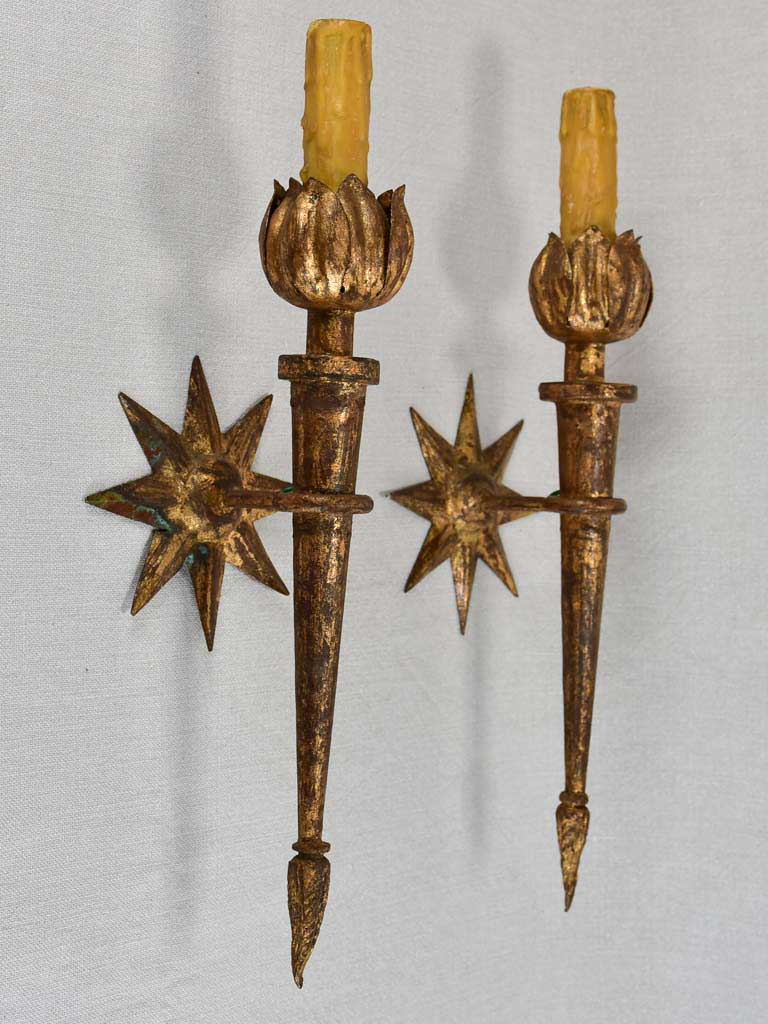 Pair of mid-century wall sconces with star motifs 17"