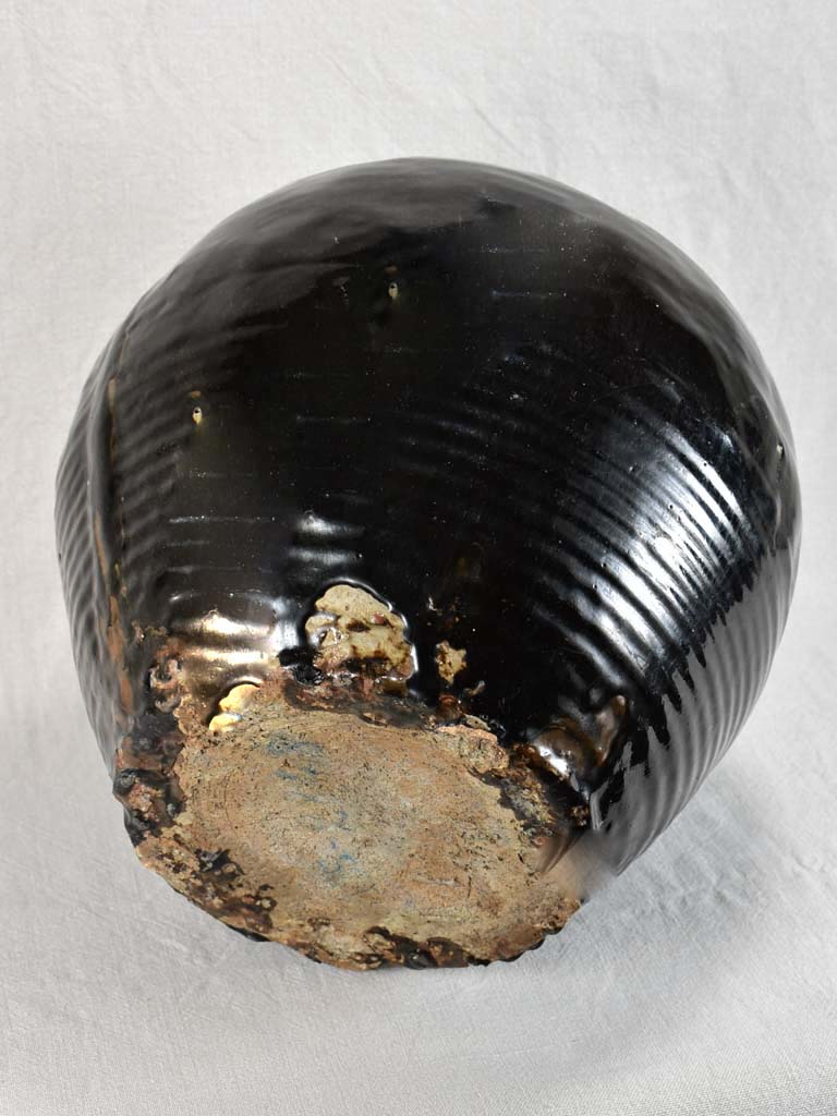 Large decorative antique pot with black glaze and ribbed base 14½"