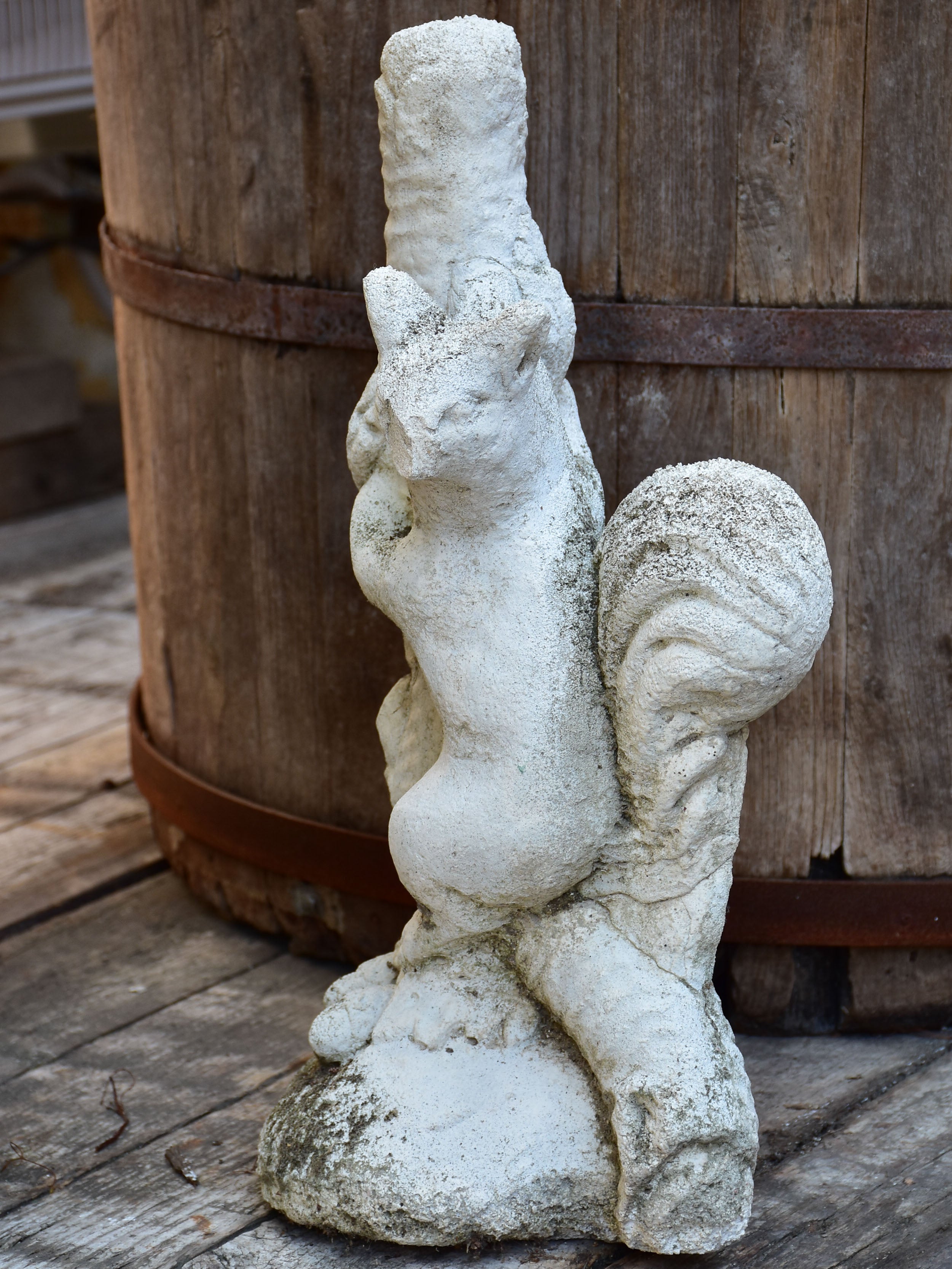 Vintage garden sculpture of a squirrel