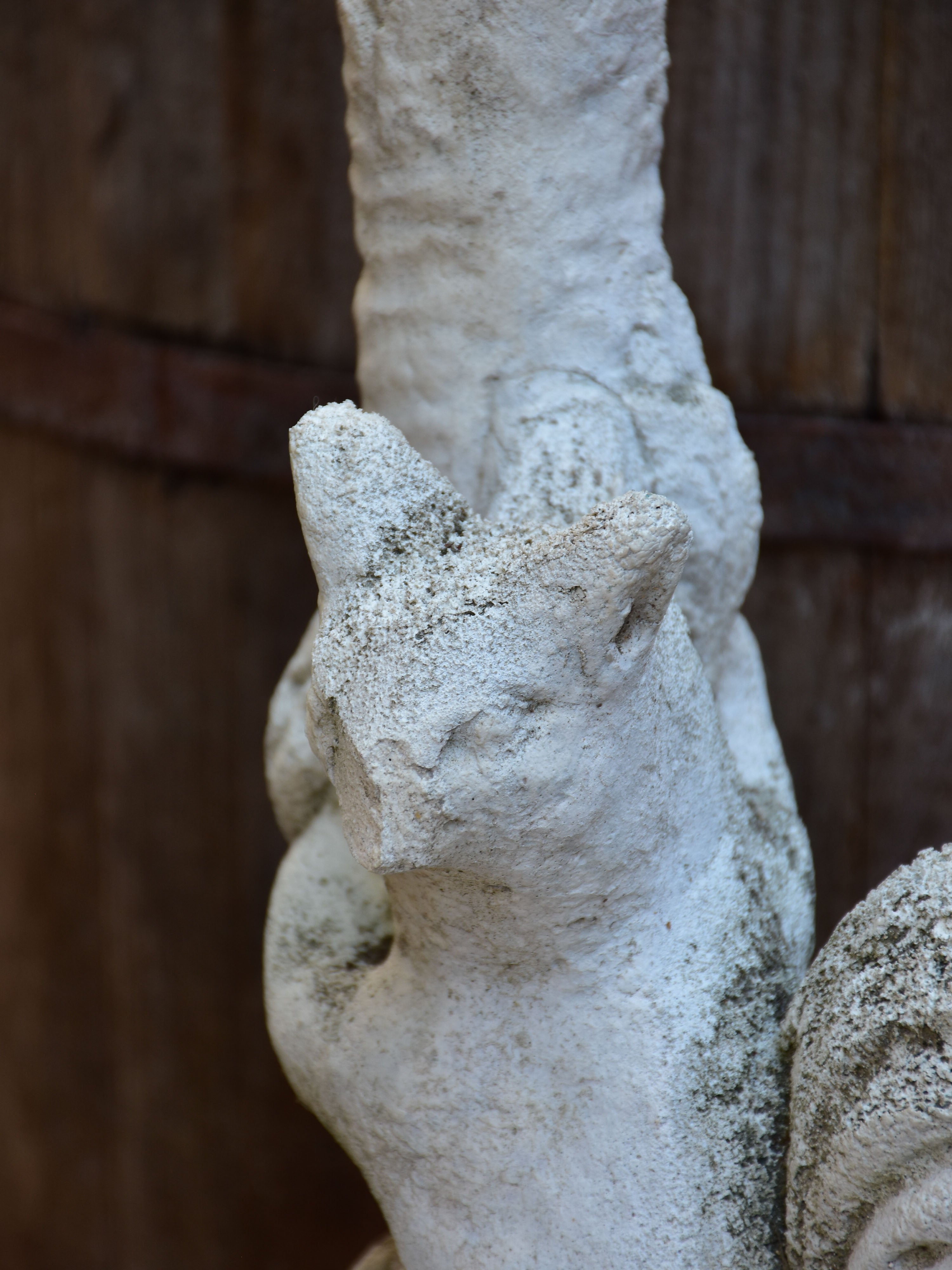 Vintage garden sculpture of a squirrel