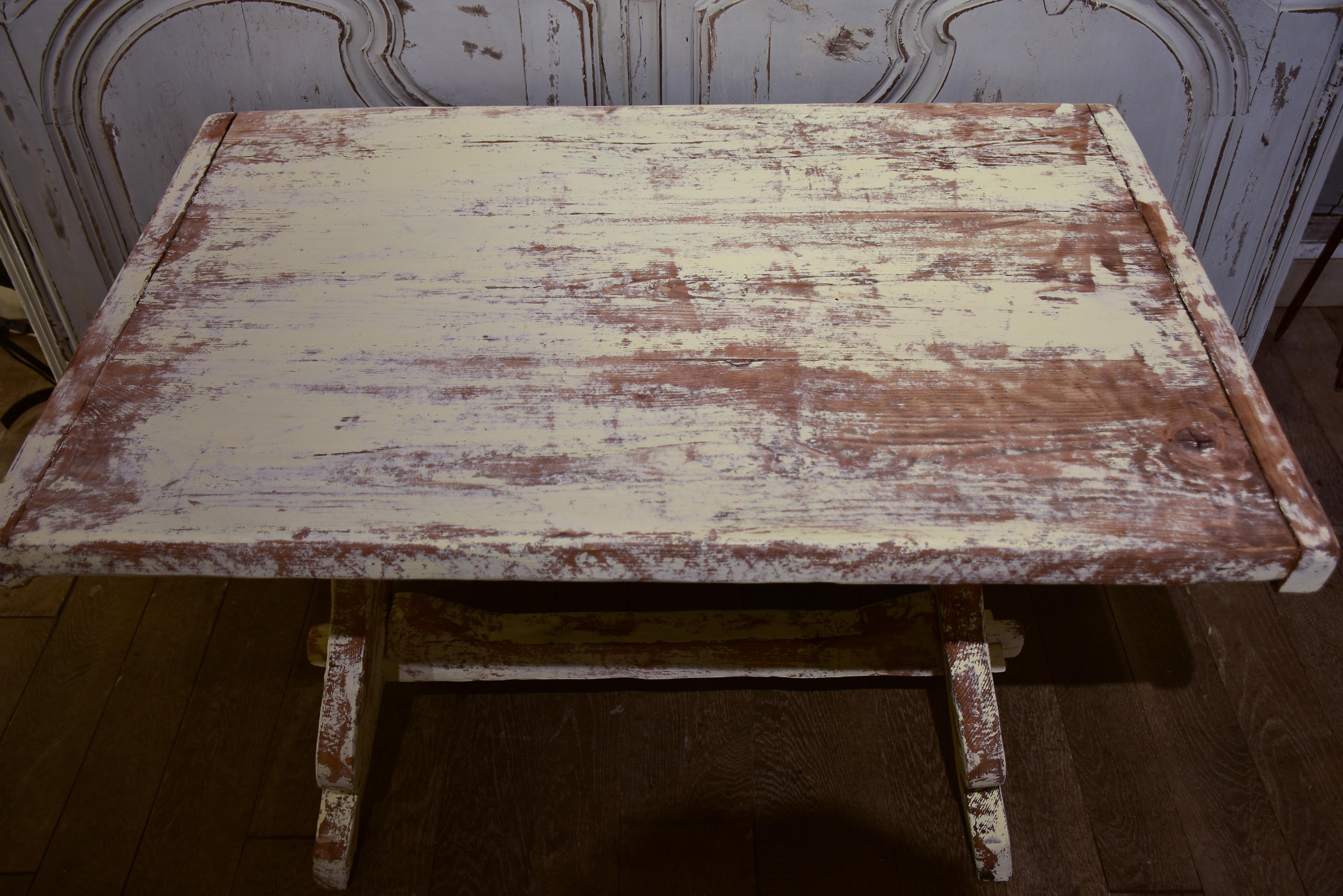 Chunky and rustic Swiss table with white patina