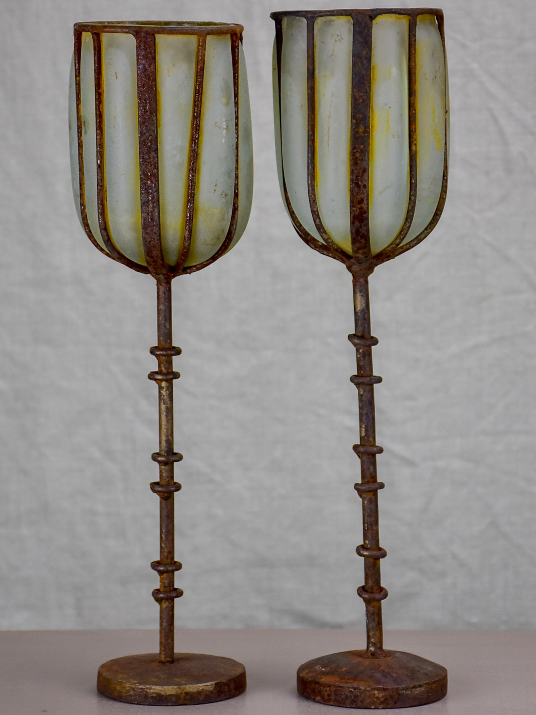 Two rustic glass and iron candlesticks - artisan made