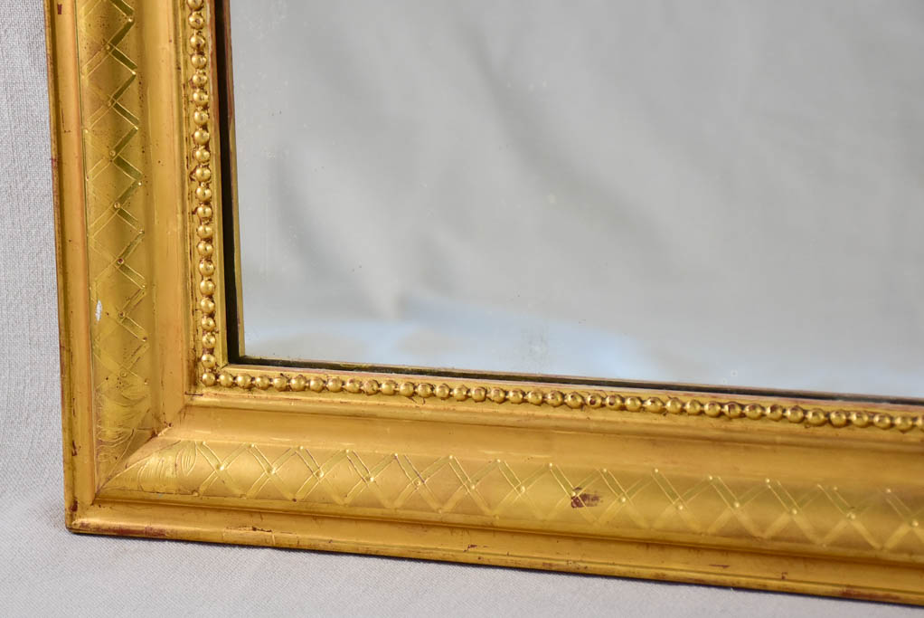 19th century Louis Philippe mirror with gilt frame and running pearl 26¾" x 35½"