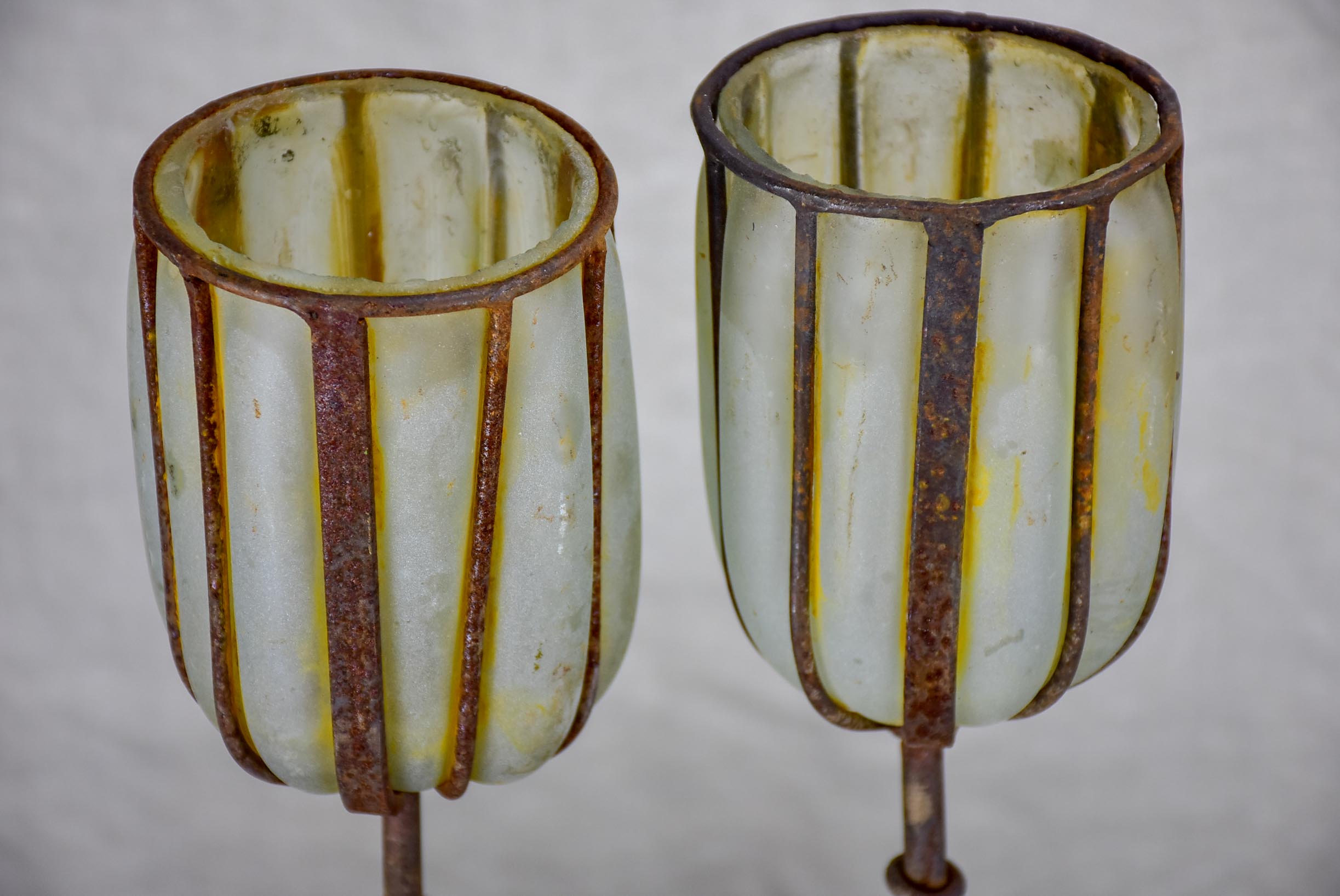 Two rustic glass and iron candlesticks - artisan made