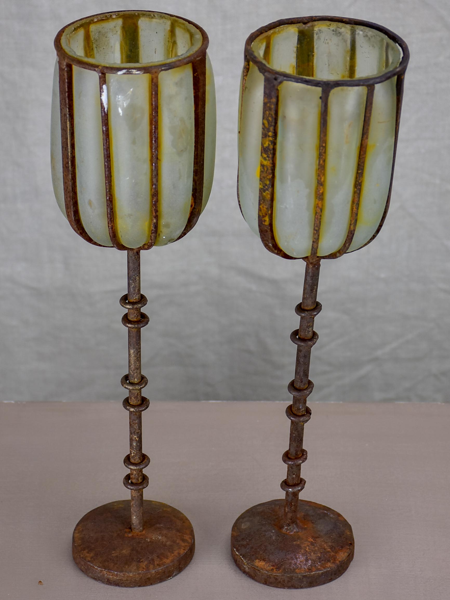 Two rustic glass and iron candlesticks - artisan made