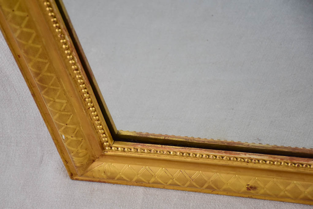 19th century Louis Philippe mirror with gilt frame and running pearl 26¾" x 35½"