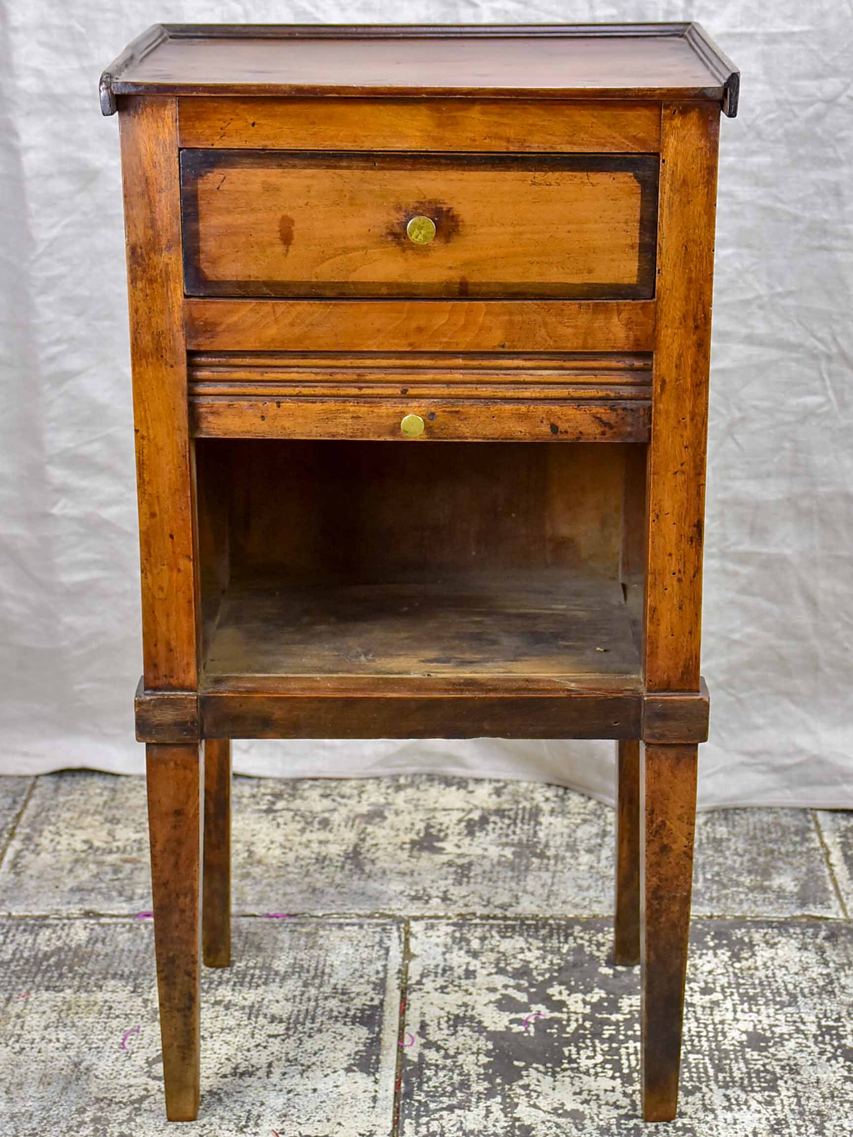 Antique French nightstand with curtain cupboard