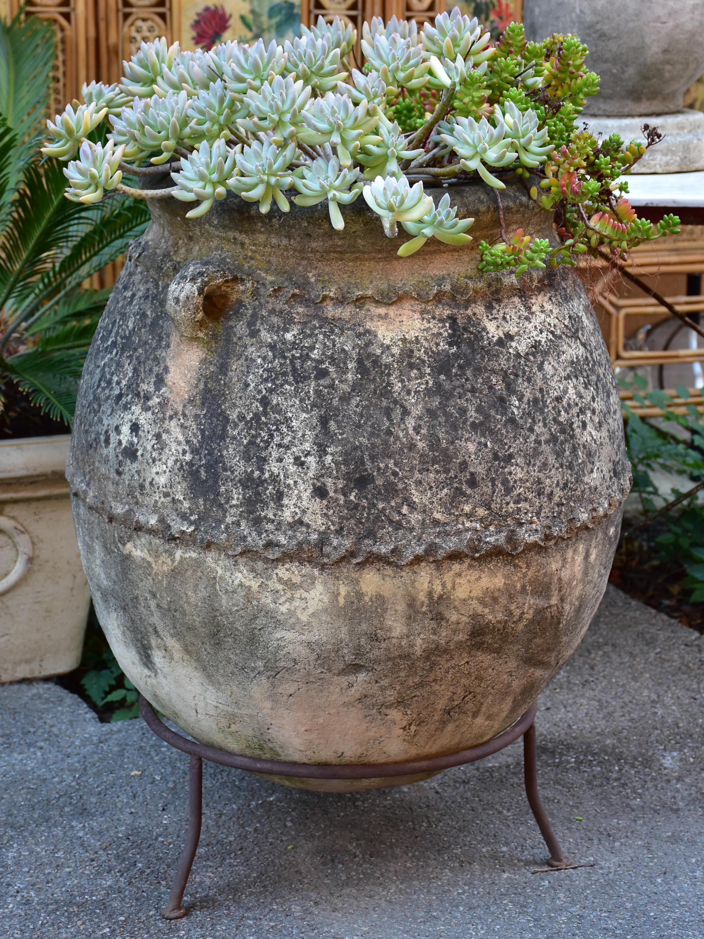 Vintage Spanish garden planter with iron stand