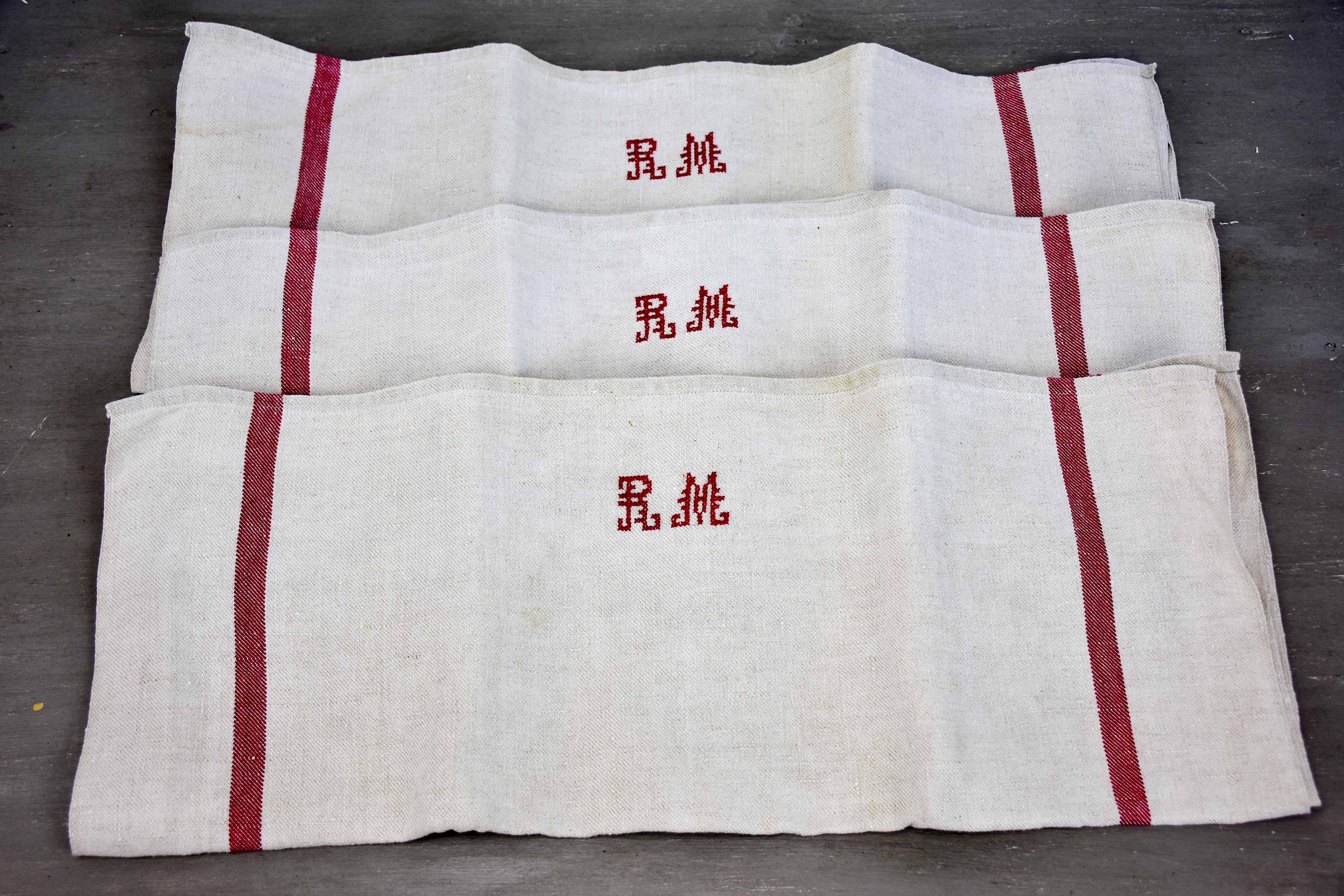 Two vintage French tea towels with large RM monogram