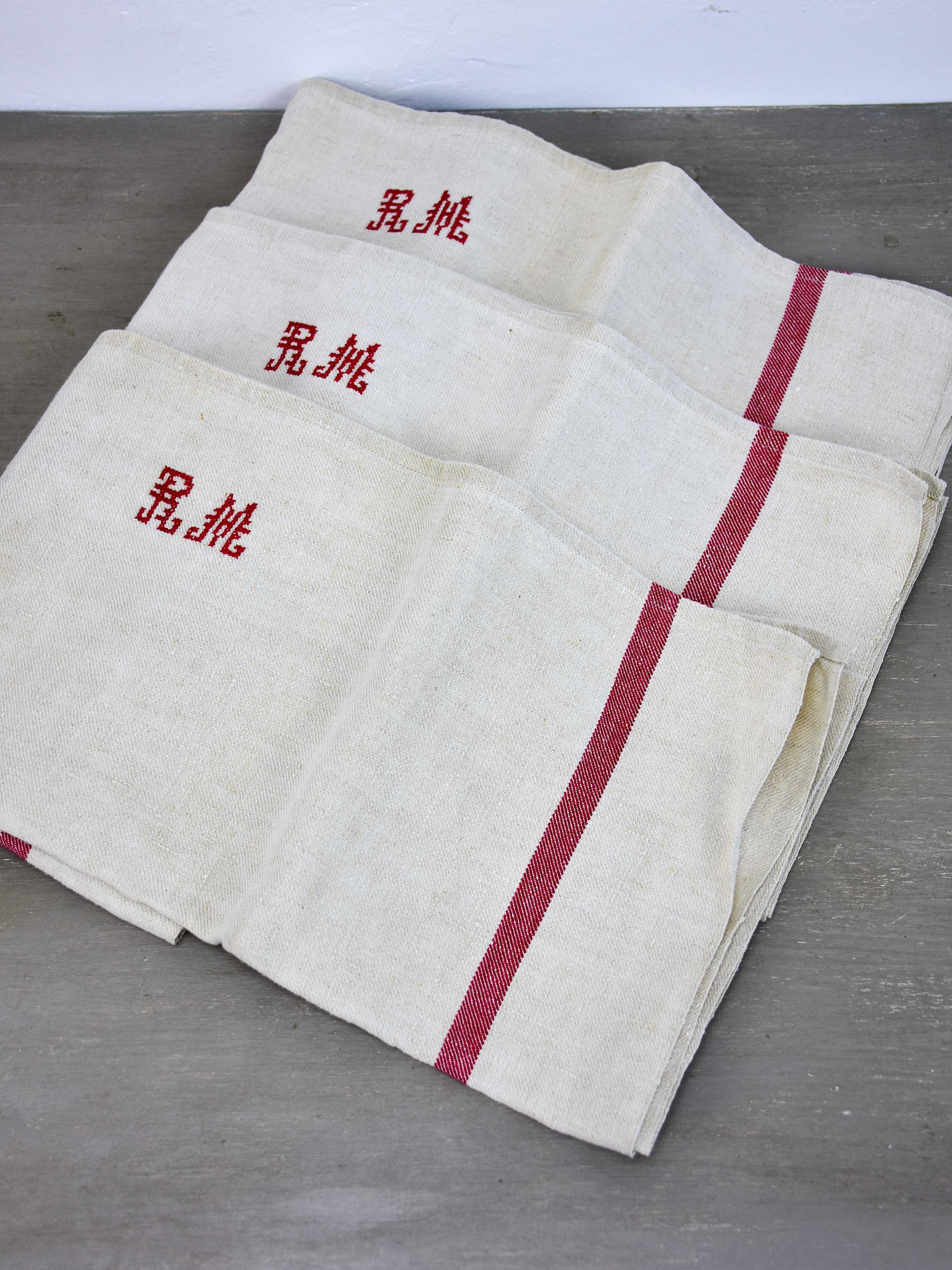 Two vintage French tea towels with large RM monogram