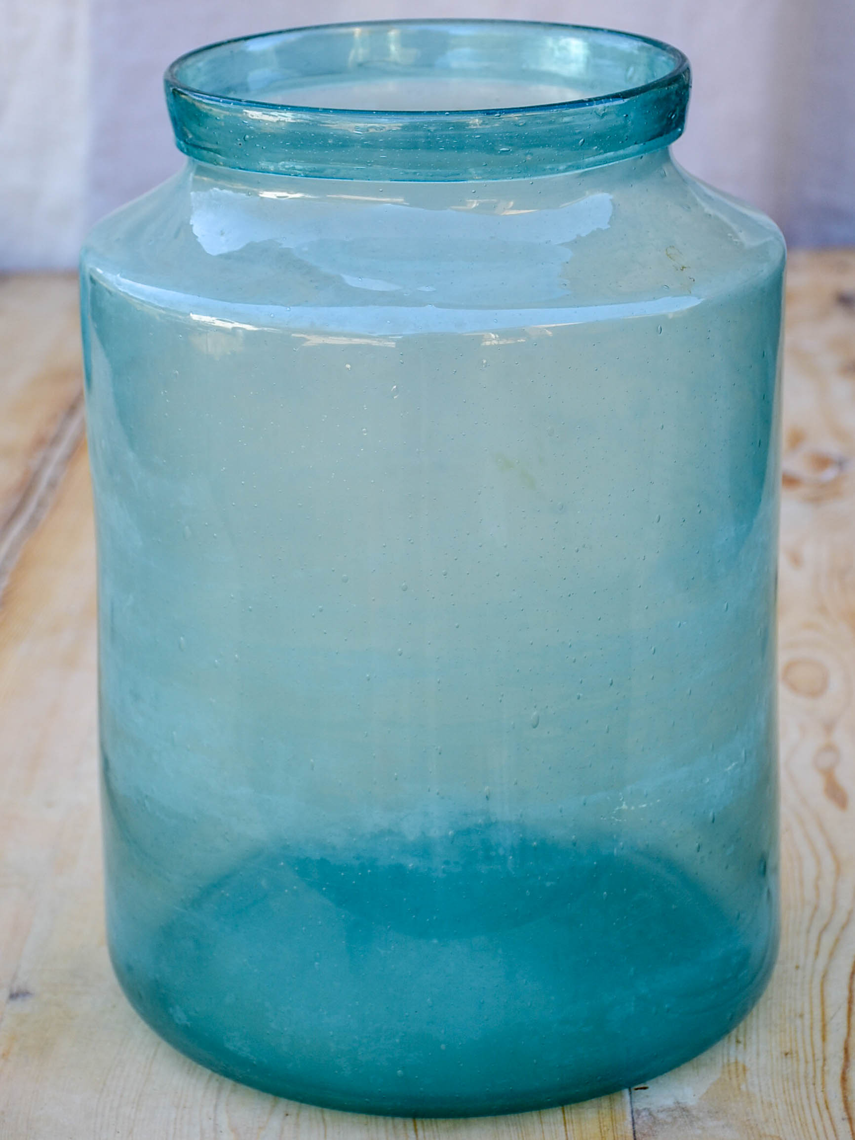 Large antique French preserving jar with blue / green glass