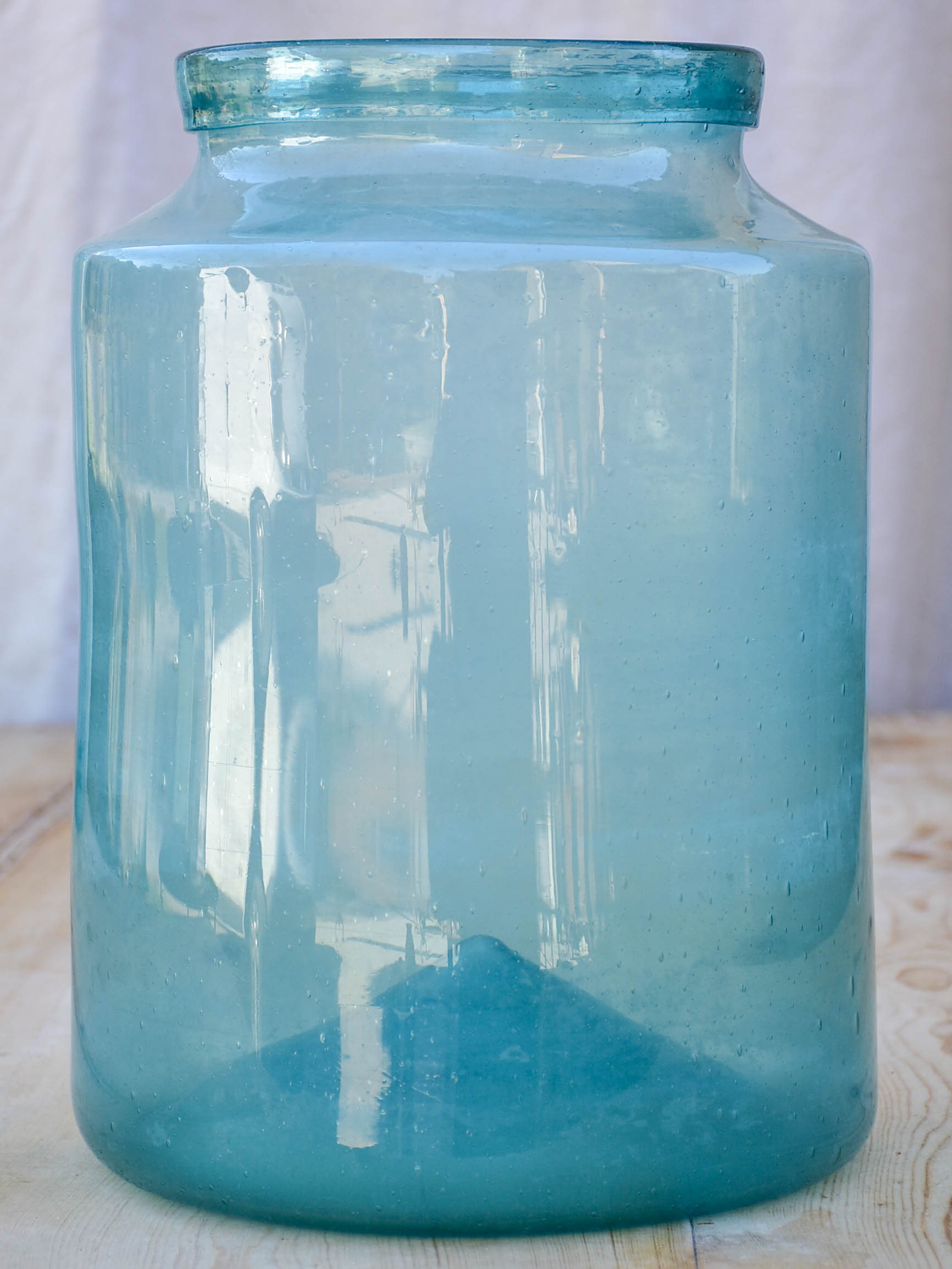 Large antique French preserving jar with blue / green glass