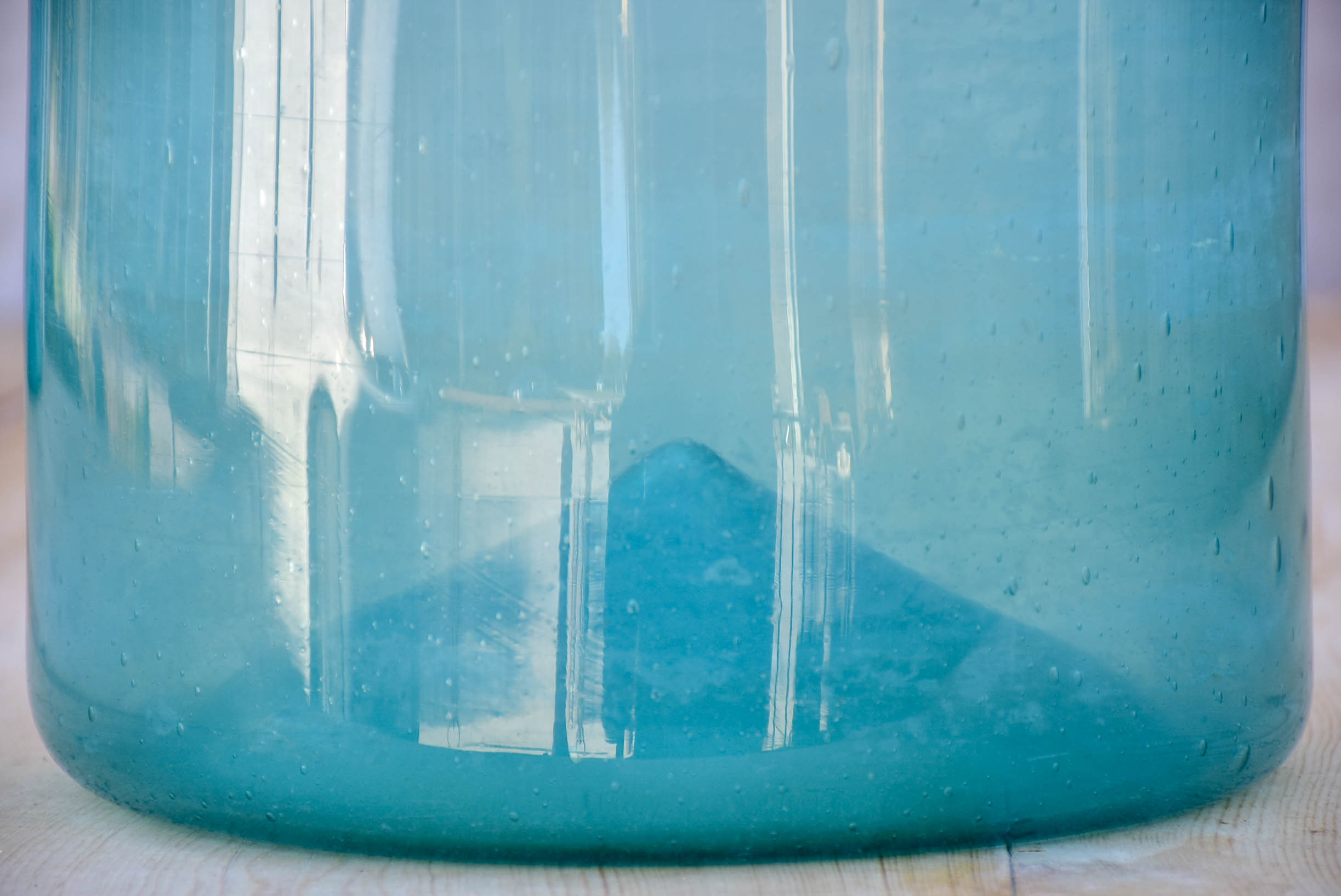 Large antique French preserving jar with blue / green glass