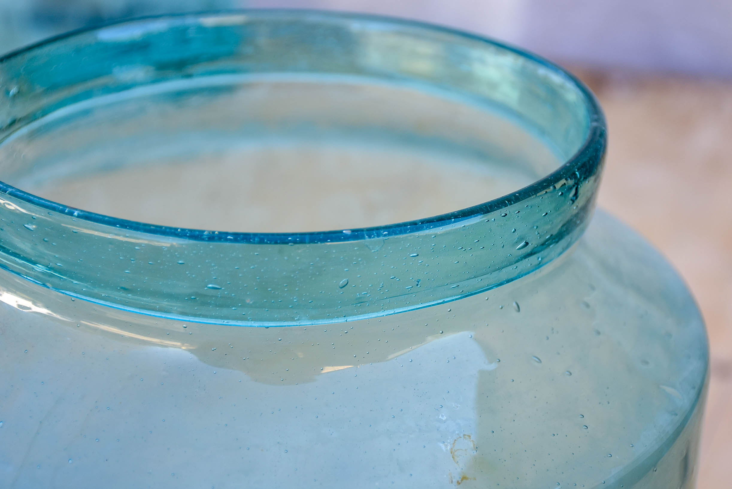 Large antique French preserving jar with blue / green glass