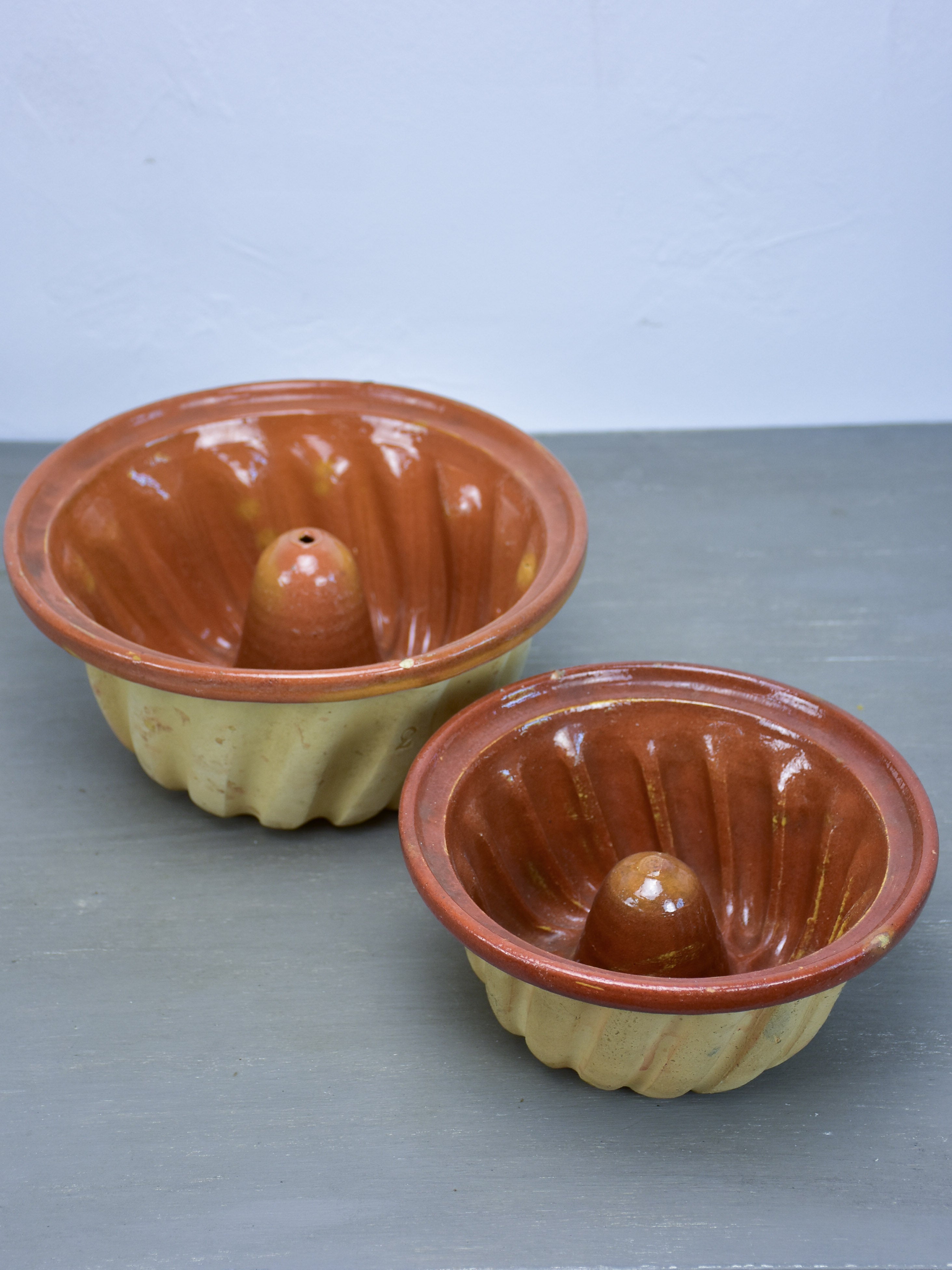 Two antique French terracotta Gugelhupf cake moulds