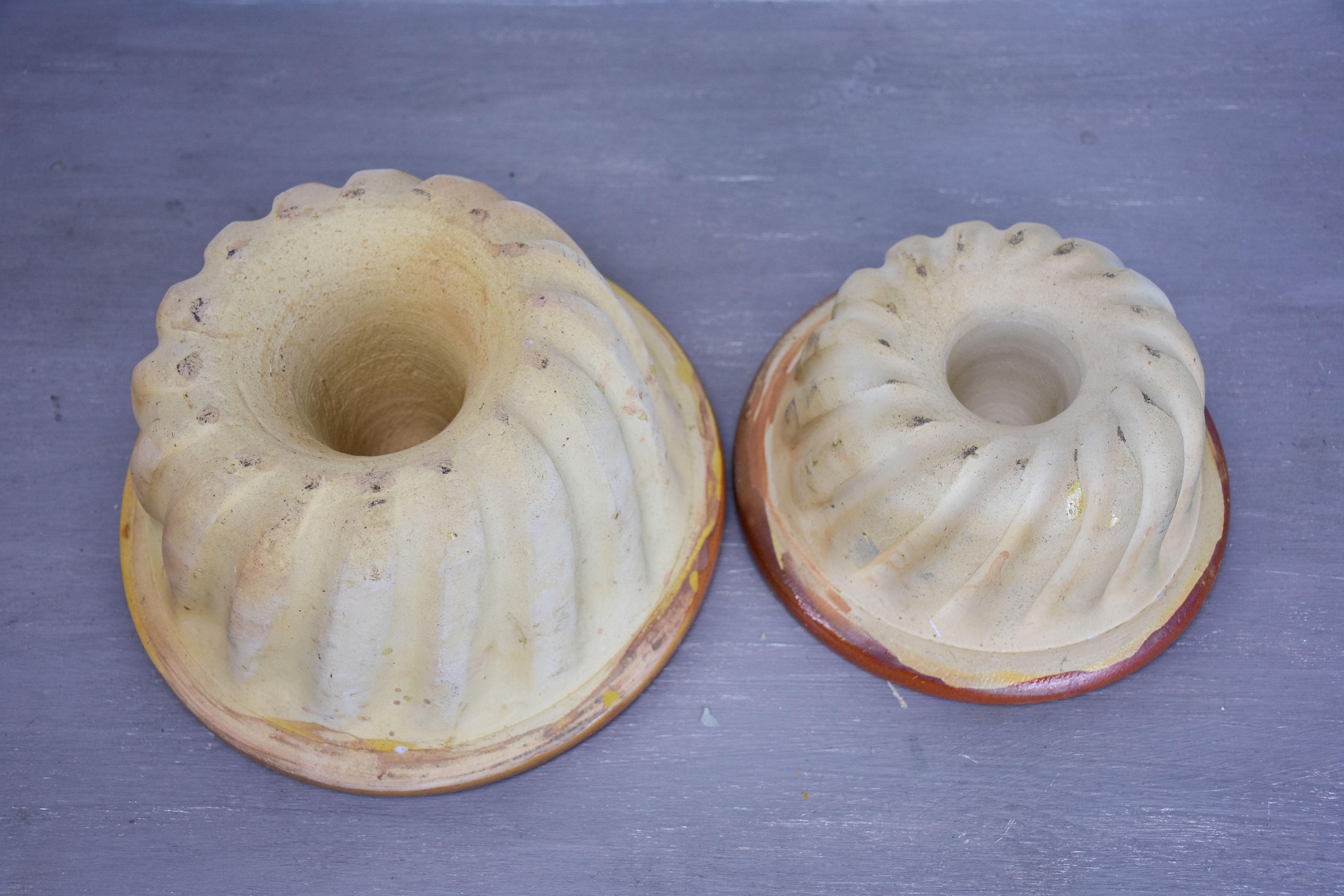 Two antique French terracotta Gugelhupf cake moulds