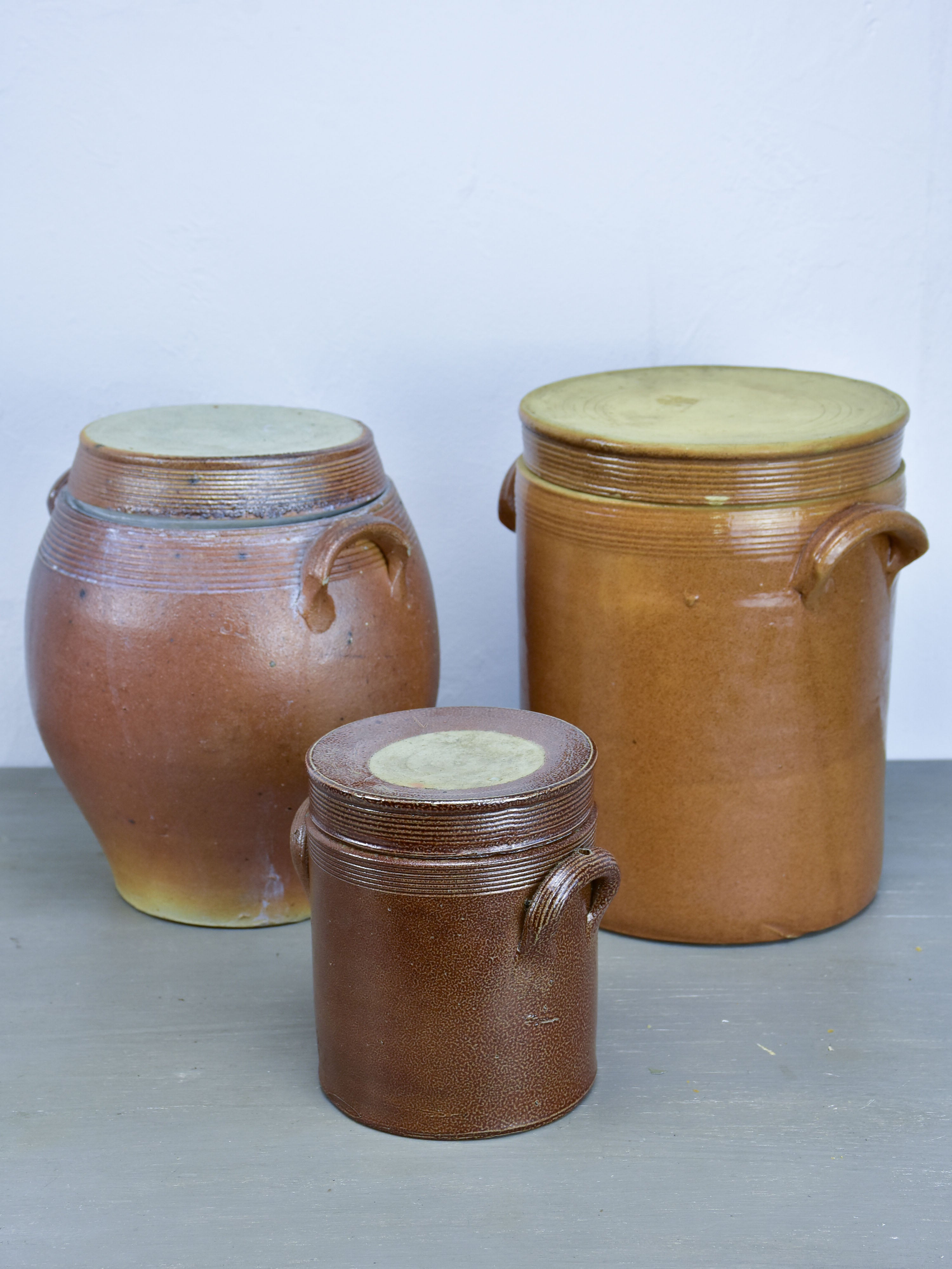 Three antique French earthenware preserving pots