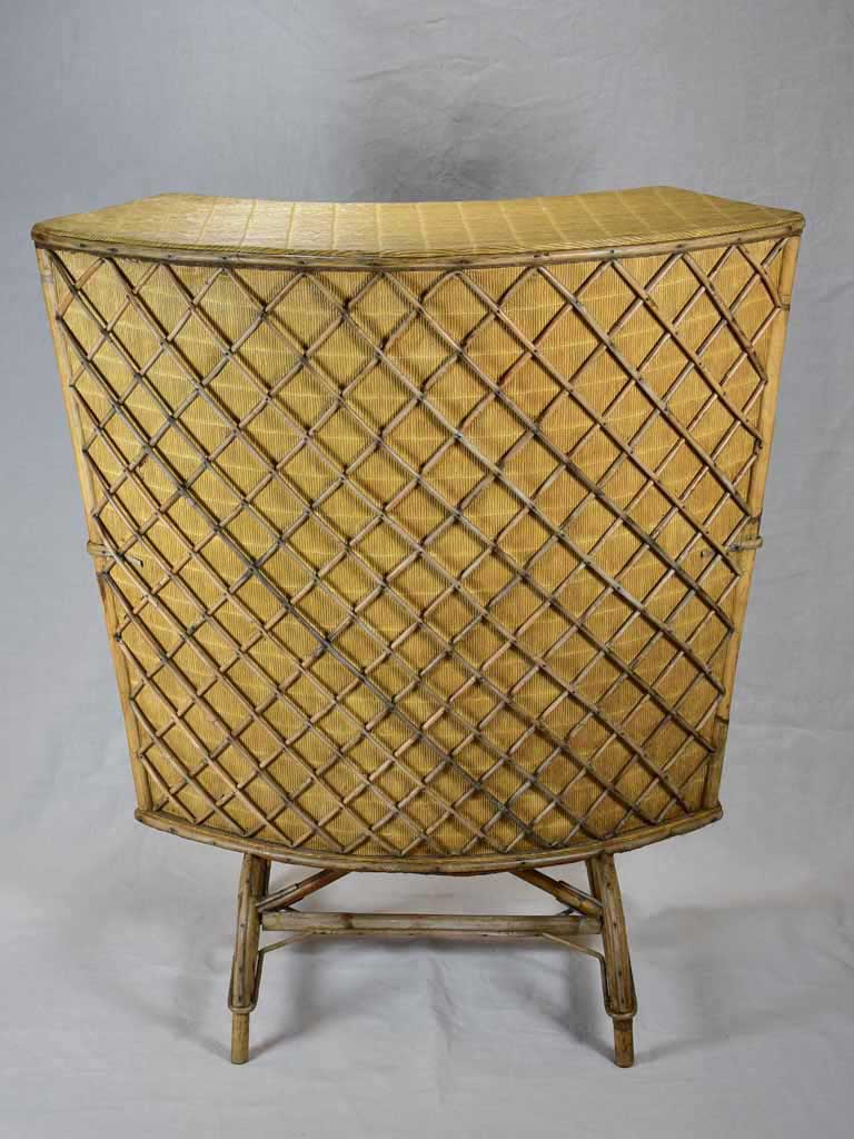 Mid-century curved rattan bar with lattice pattern