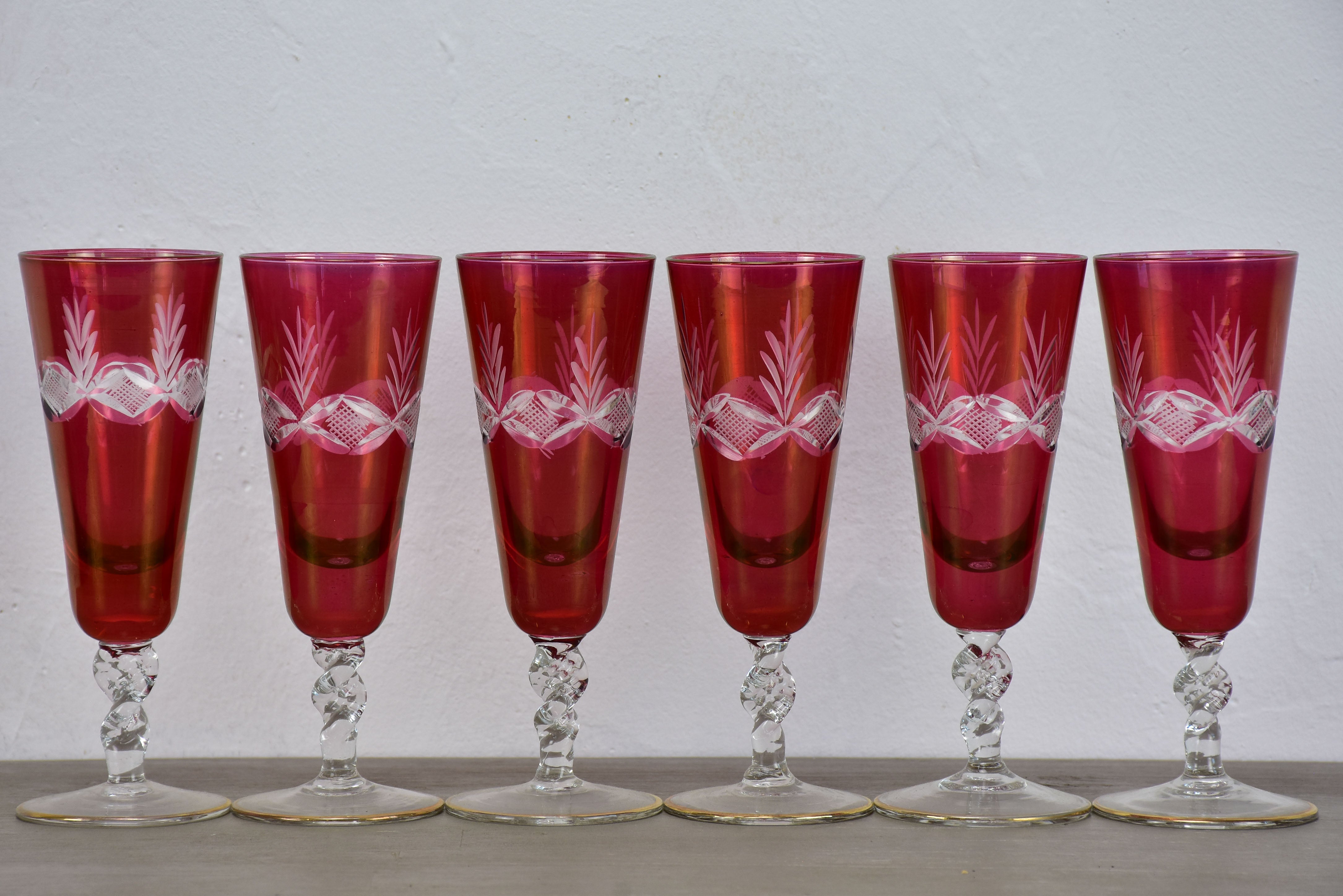 Six antique French champagne glasses with red etched glass