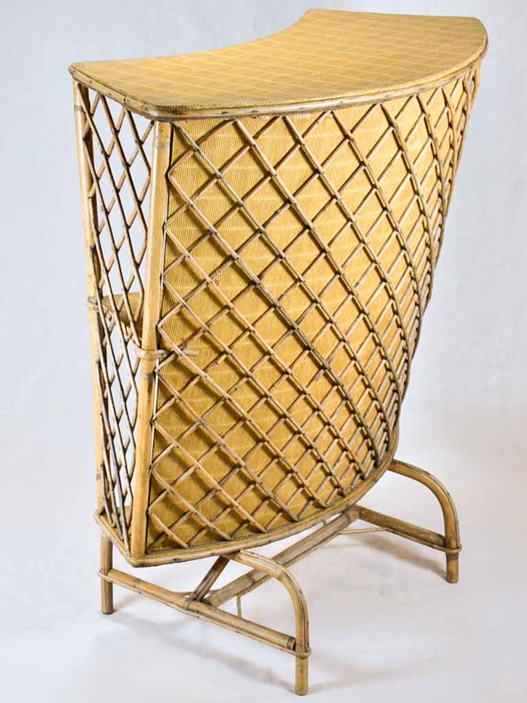 Mid-century curved rattan bar with lattice pattern