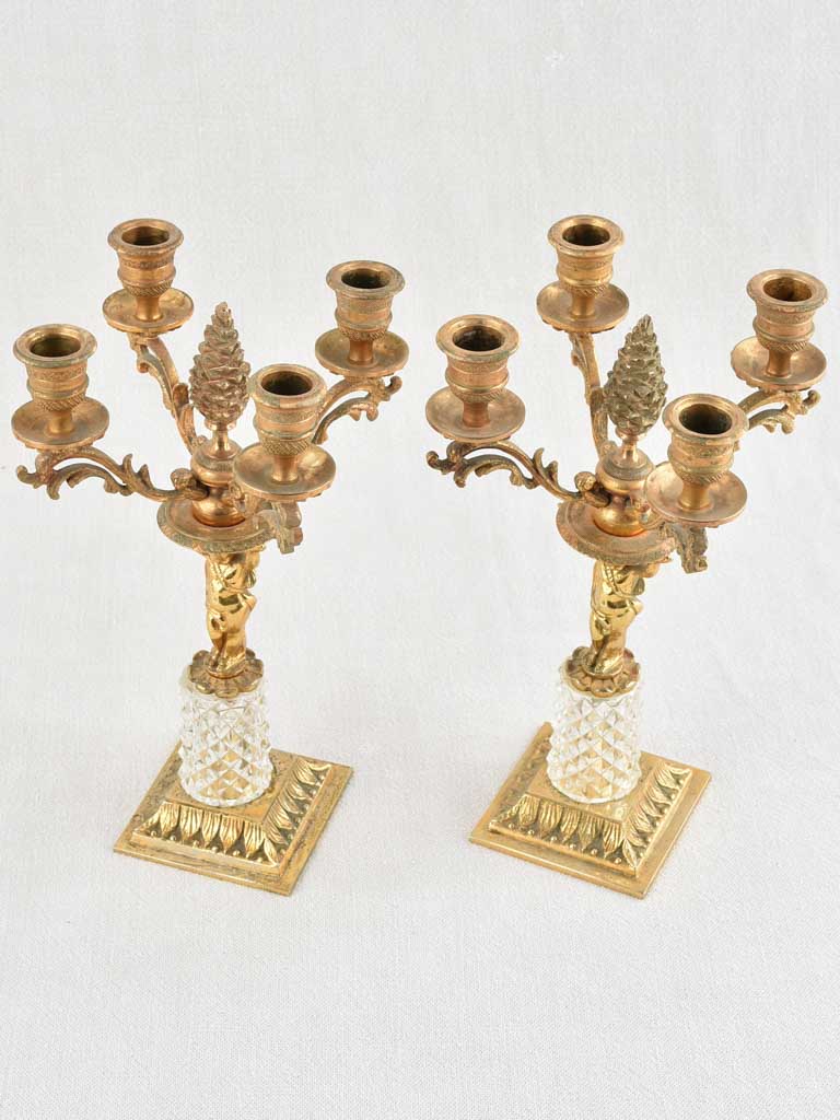 Festive Louis XVI gold candlesticks