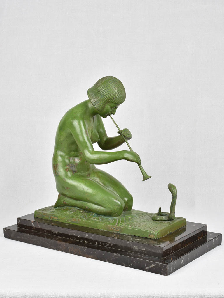 1930s bronze sculpture of a snake charmer